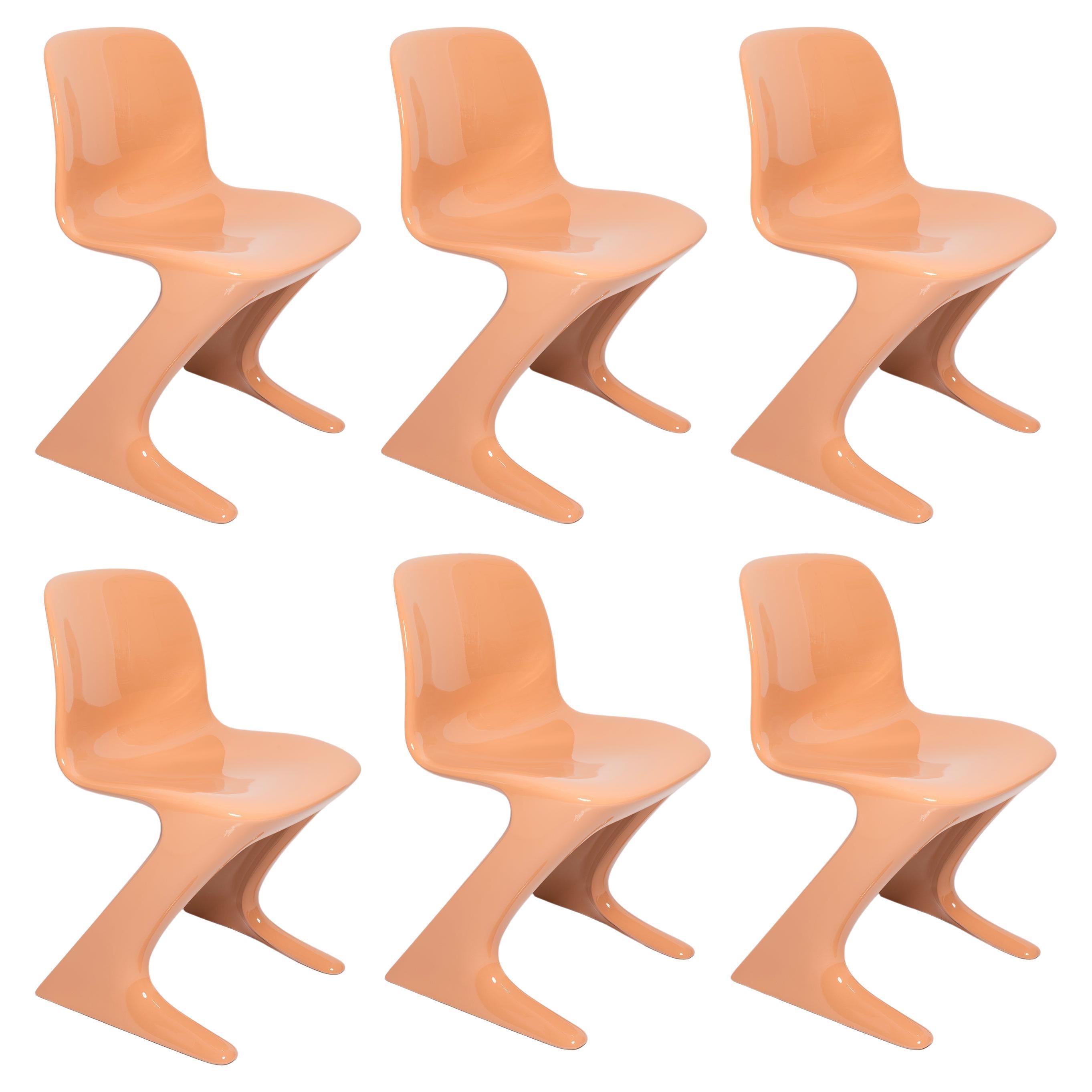 Sei sedie canguro arancione-albicocca di metà secolo, Ernst Moeckl, Germania, 1968