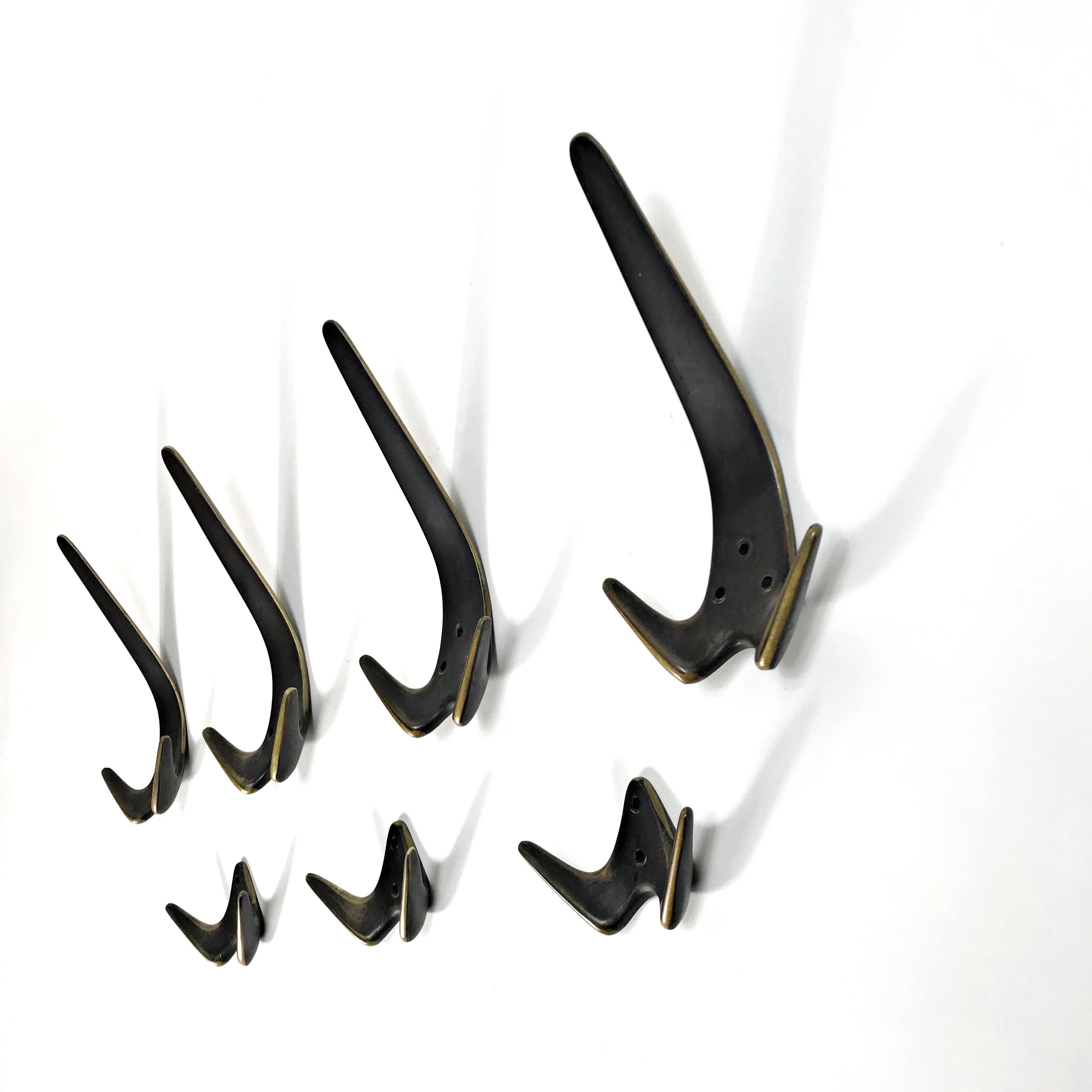 Patinated Carl Auböck Midcentury Six Polished Brass Wall Coat Hooks, 1950s, Austria For Sale