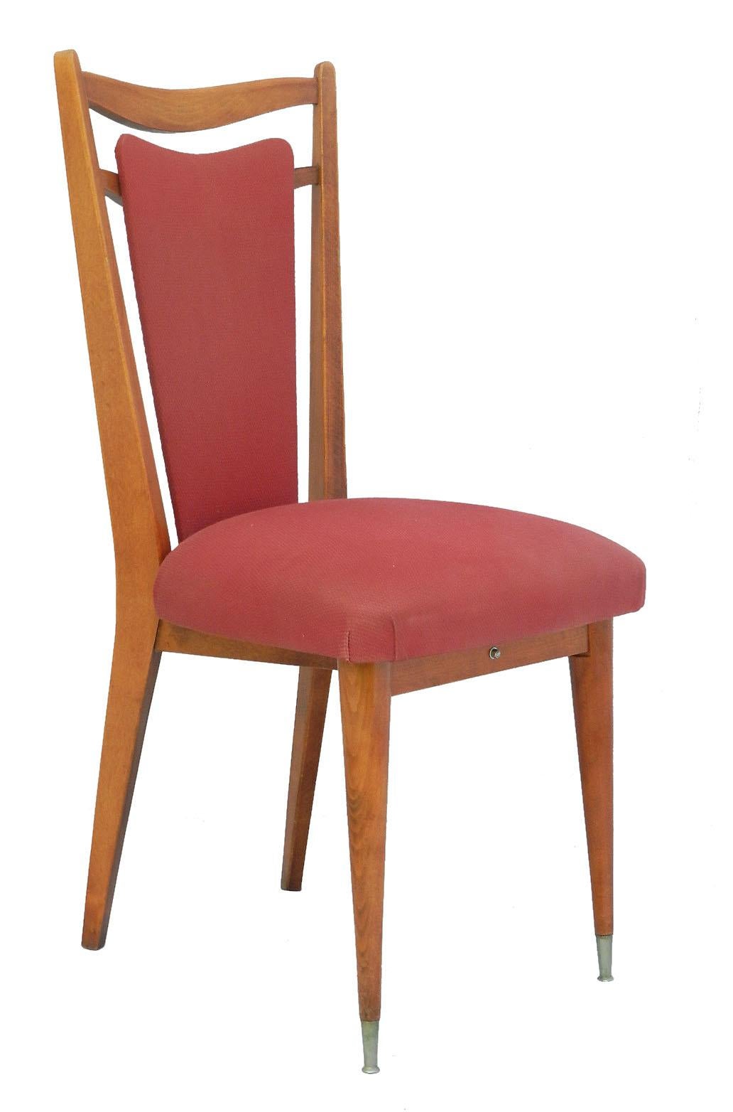 Six dining chairs midcentury French, circa 1970
Makers label 
Superb shape 
Upholstered and covered in red fabric if you would like a quote to do this please ask for details 
Unusual system for removing seat for recovering
In overall good condition