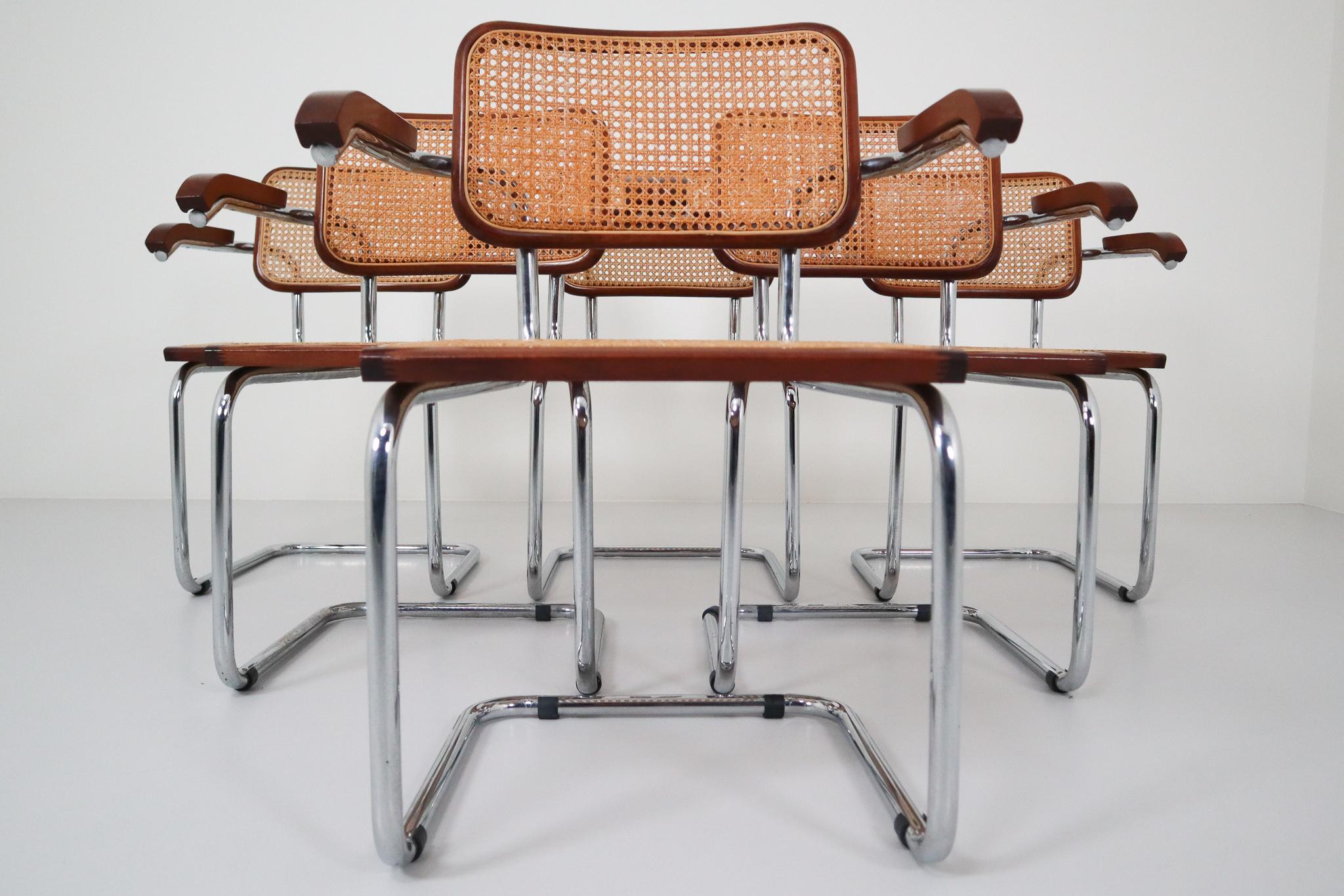 Beautiful set of six “Cesca” armchairs manufactured in Italy, 1970. Cane seat and back with wood finish, chrome steel tubular cantilever frame. Cesca chairs were originally designed in 1928 by French Hungarian architect Marcel Breuer and named after