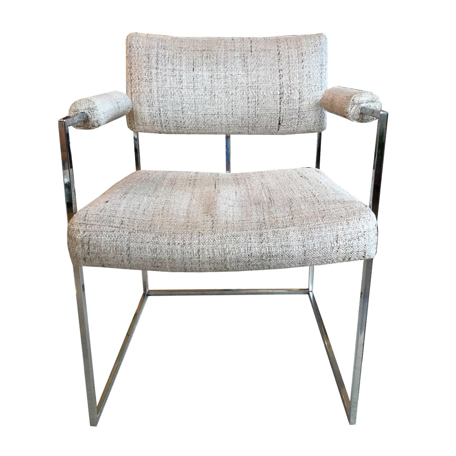 A set of six Milo Baughman Chrome frame chairs newly upholstered in a chenille fabric.
Two of the chairs have arms, ideal to be at each end of a table. Very comfortable and elegant chairs overall.