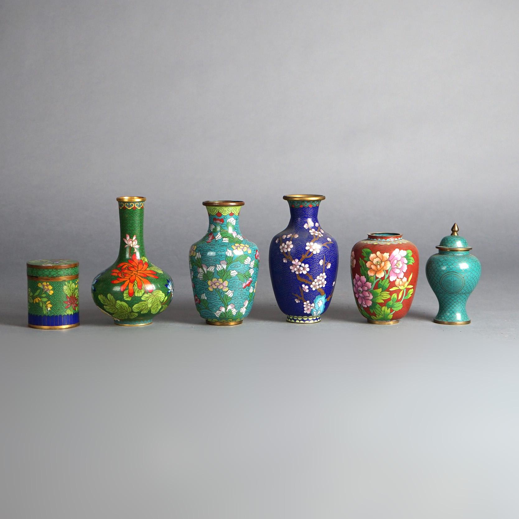 Six Miniature Antique Japanese Meiji Cloisonne Enameled Items including Flower Vases, Urns and Covered Jar C1920

Measures- Green Jar: 3''H x 2.5''W x 2.5''D; Green Turquoise: 4.75''H x 2.75''W x 2.75''D; Red/Brown With Flowers: 3.25''H x 3.5''W x