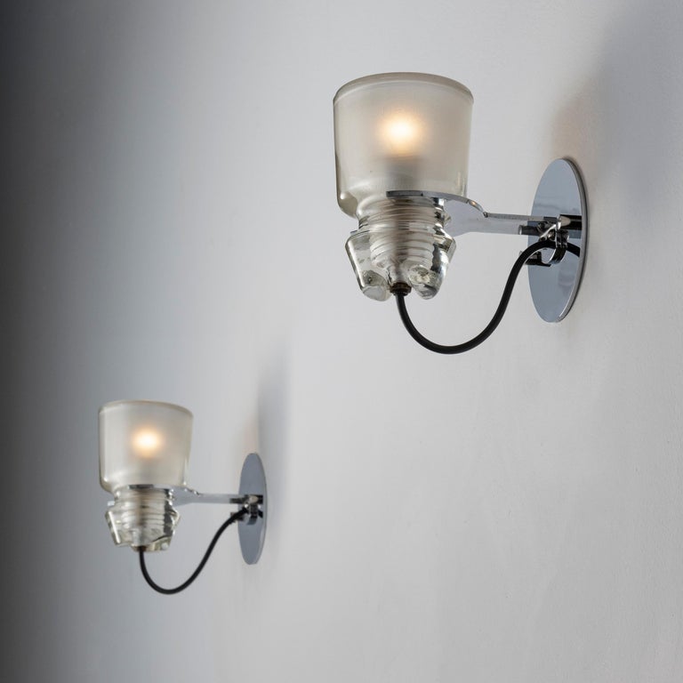 Six Model 1132 sconces by Marco Zanuso for Oluce. Designed and manufactured in Italy, circa 1960's. Crystal glass, custom chrome backplates. WIred U.S. standards. We recommend one E14 60w maximum candelabra bulbs per socket. Bulbs not included.