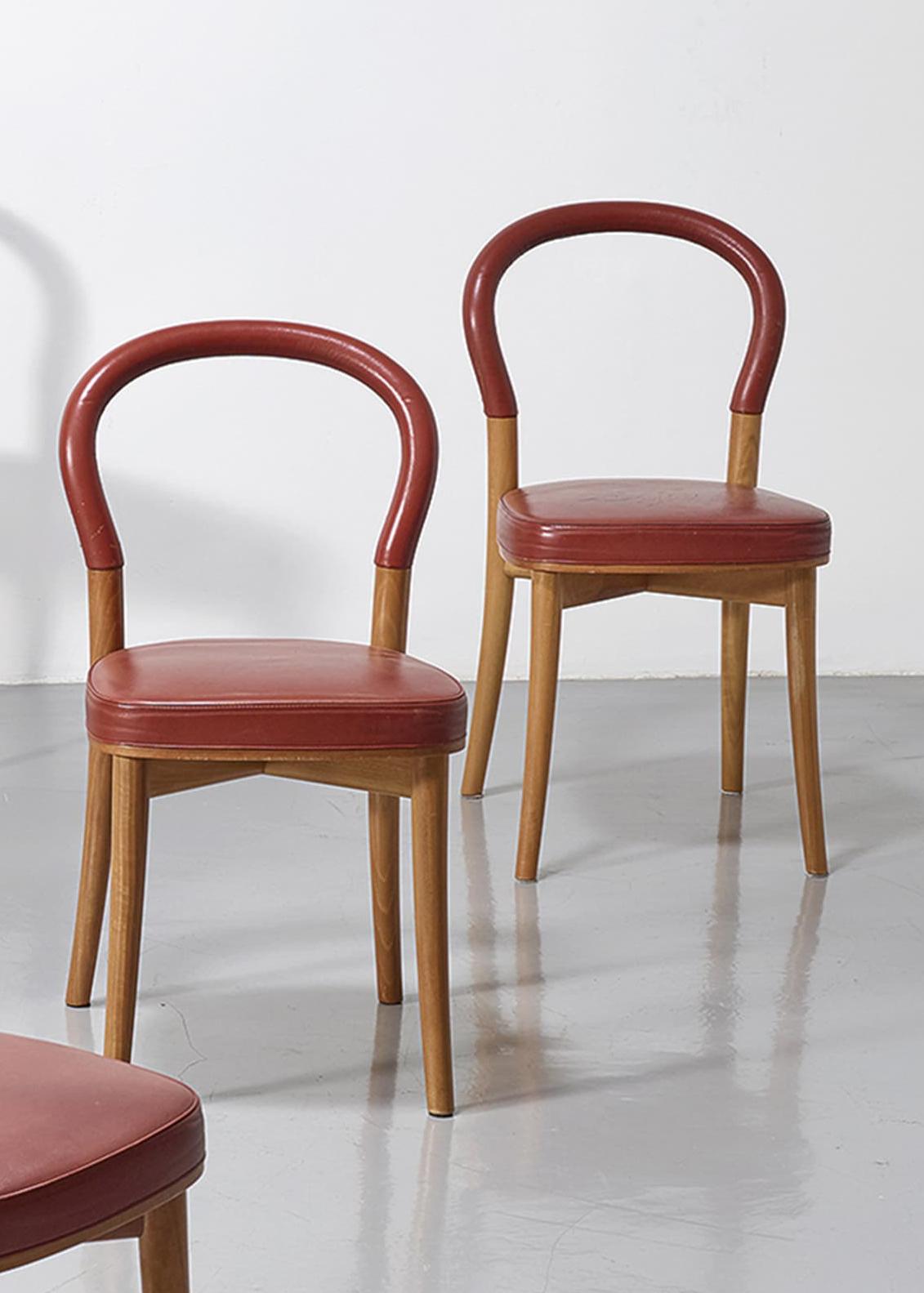 A set of six Model 501 Göteborg I dining chairs designed by Gunnar Asplund in 1983 for Cassina, Italy. The chairs are in vintage condition with some were from previous owners to the leather upholstery. The walnut frame and legs are stamped with the