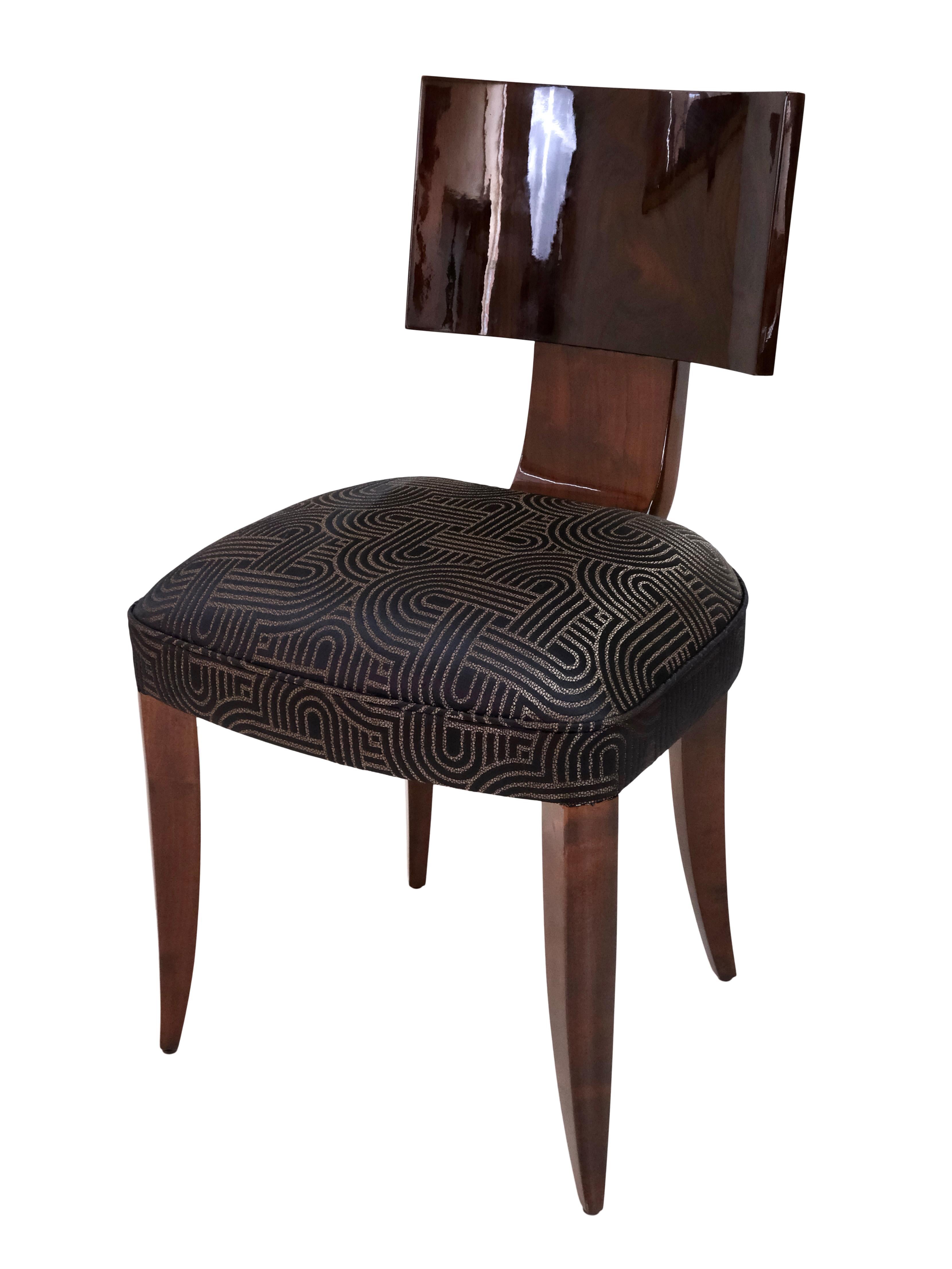 Dining room chairs without armrests
High quality restored 
Probably ash stained, high gloss lacquered 
Black and gold upholstery with Art Deco typical ornaments

Set consisting of 6 items

Original Art Deco, France