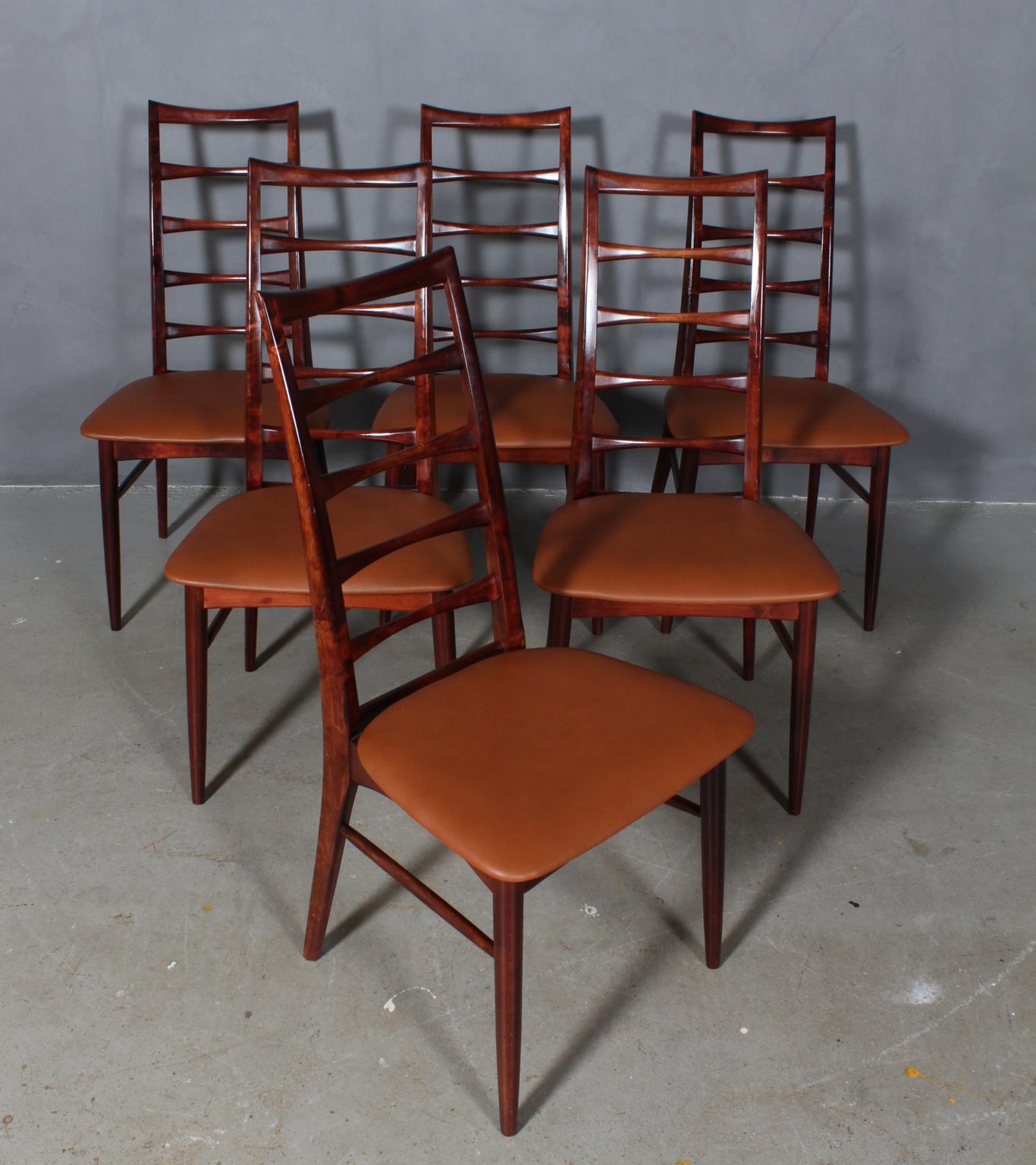Set of six Niels Koefoed dining chairs made in solid mahogany.

New upholstered in cognac pure aniline leather.

Model Lis, made by Niels Koefoeds Møbelfabrik Hornslet, 1960s.