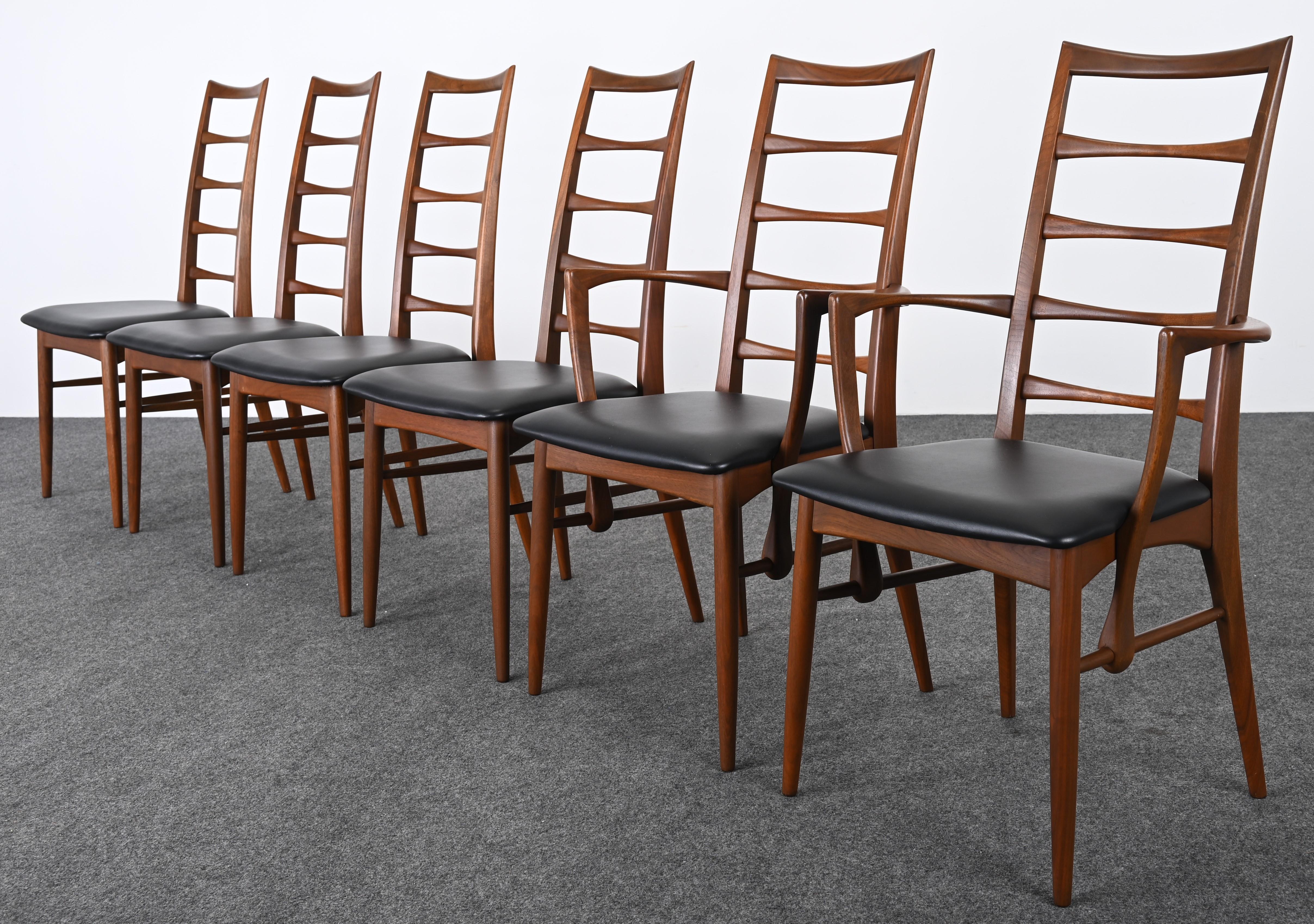 A wonderful set of six teak dining chairs by Niels Koefoed for Koefoeds Hornslet, circa 1960s. In this set are 4 side chairs and 2 armchairs with original black vinyl seats. The ladder back chairs are beautifully proportioned with beautiful details