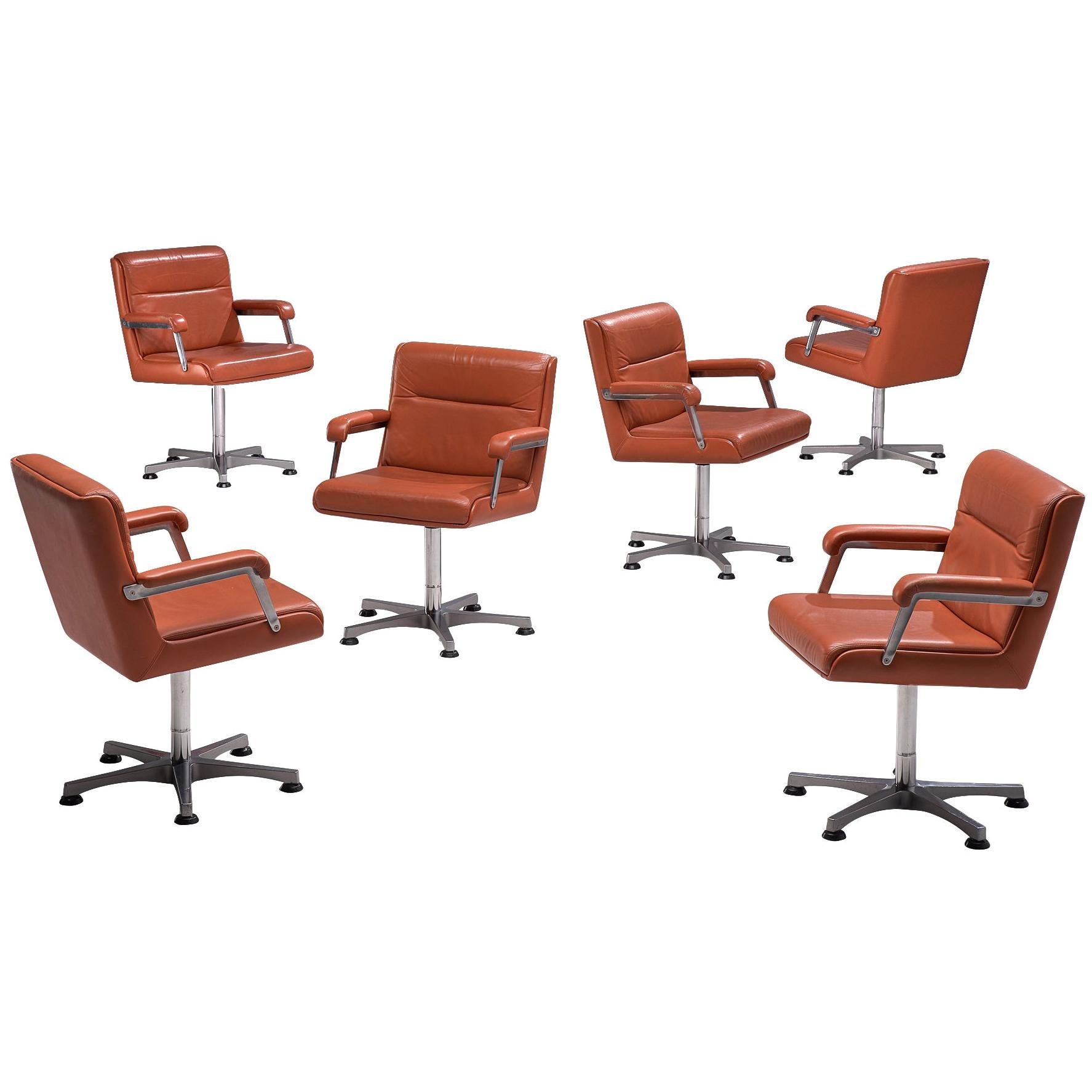 Six Norwegian Office Chairs in Terracotta Leather