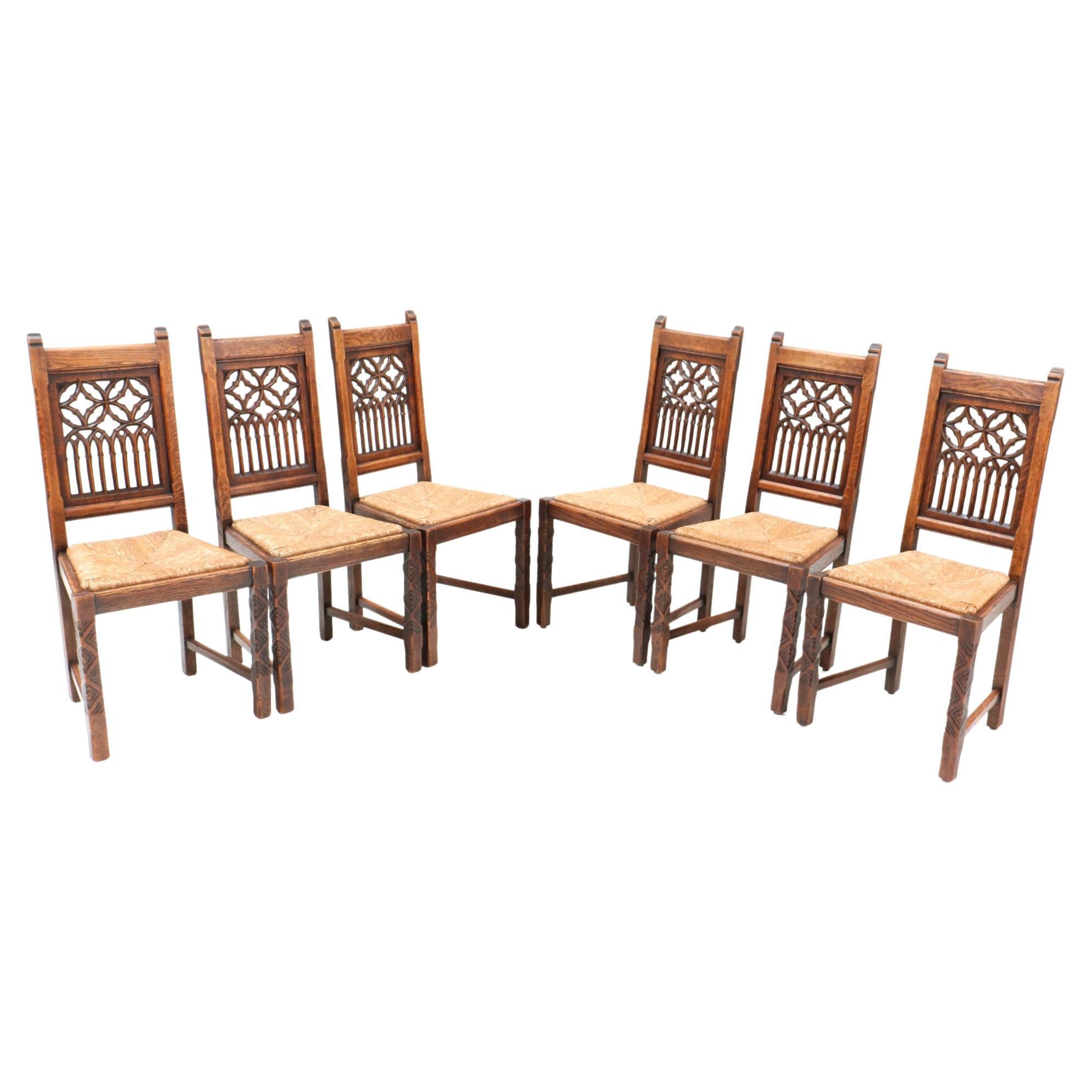 Six Oak Gothic Revival Dining Room Chairs, 1930s