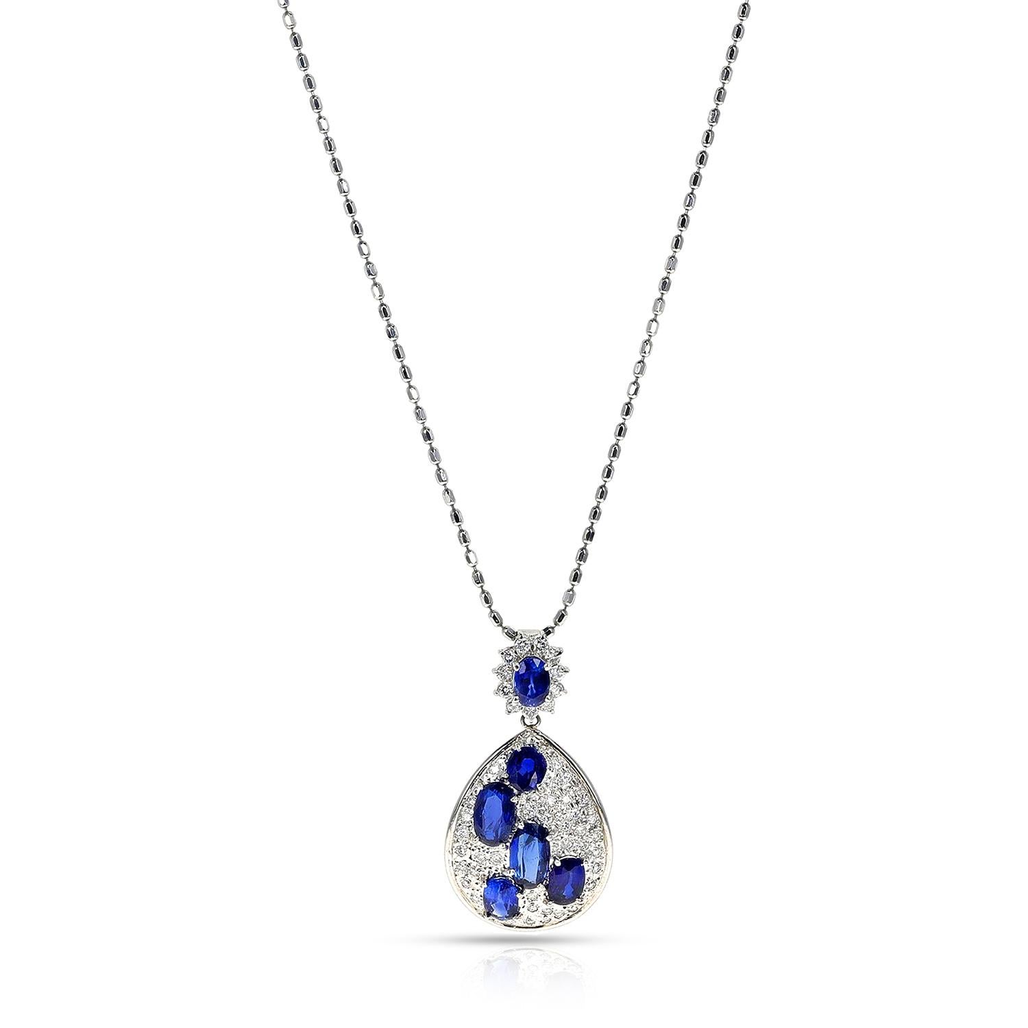 A Pendant Necklace with Six Oval Sapphires and Diamonds made in Platinum with a chain. The sapphires weigh appx. 5.91 carats and the diamonds weigh appx. 0.71 carats. The total weight of the necklace is 15.86 grams. 