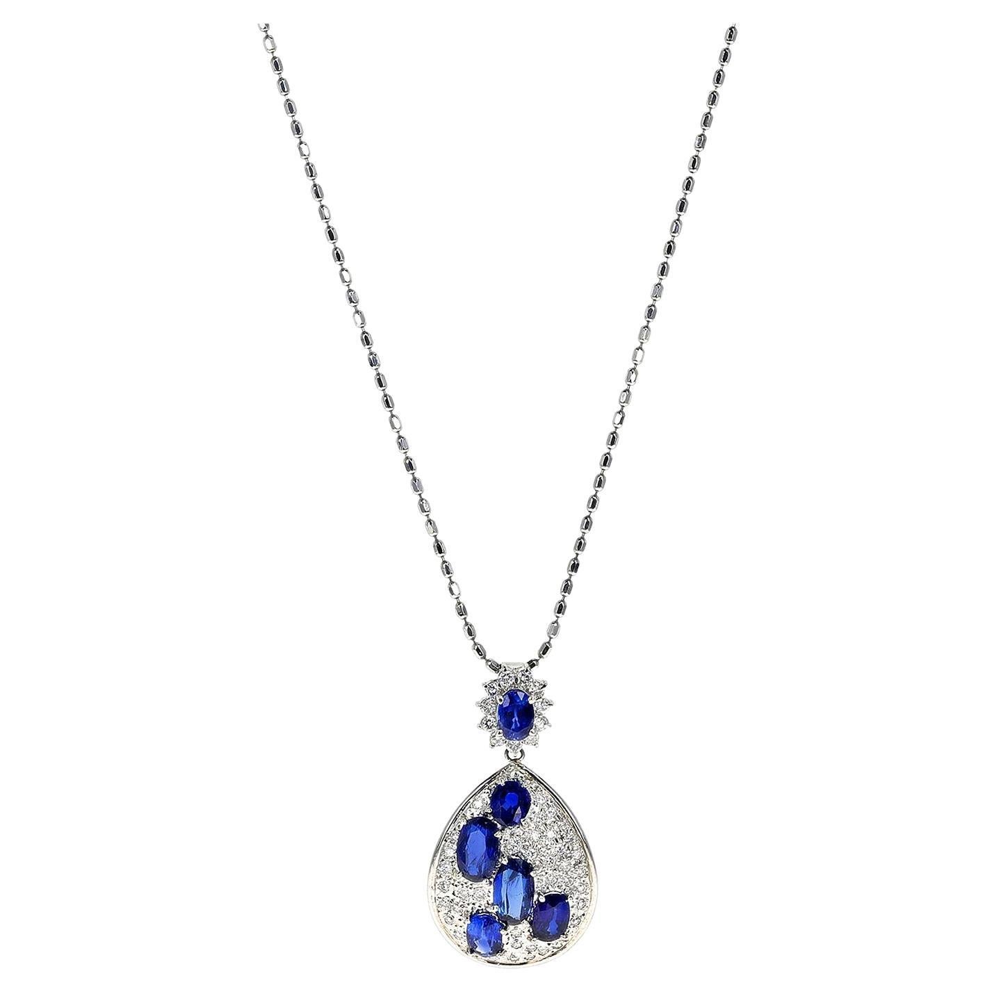 Collier pendentif en platine avec six saphirs ovales et diamants en vente