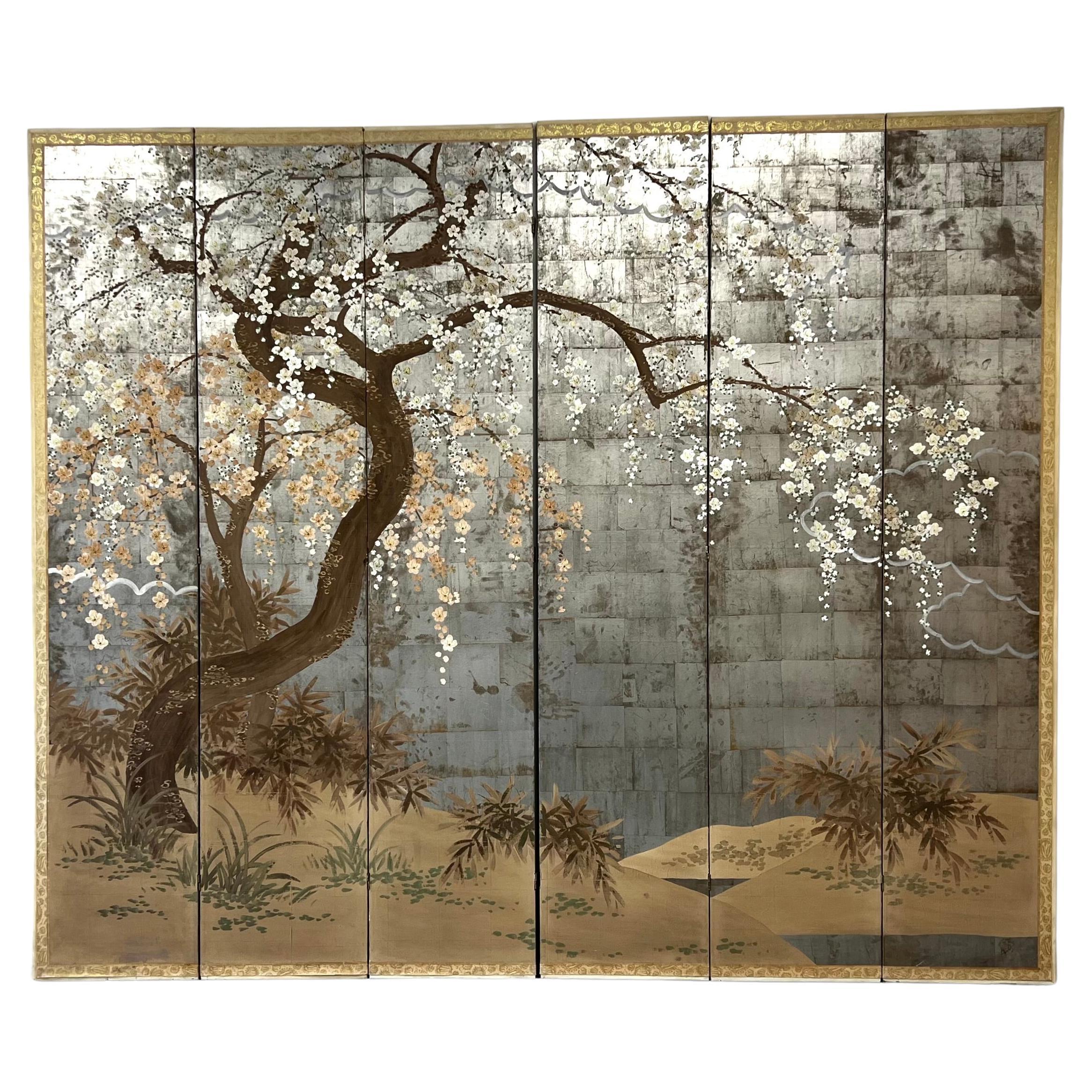 1960’s Large six panel hand painted cherry blossom tree on silver leaf background folding screen. 

In original vintage condition with minor wear consistent with age.
Minor loses at bottom of frame(see detail photos). The back is unfinished.