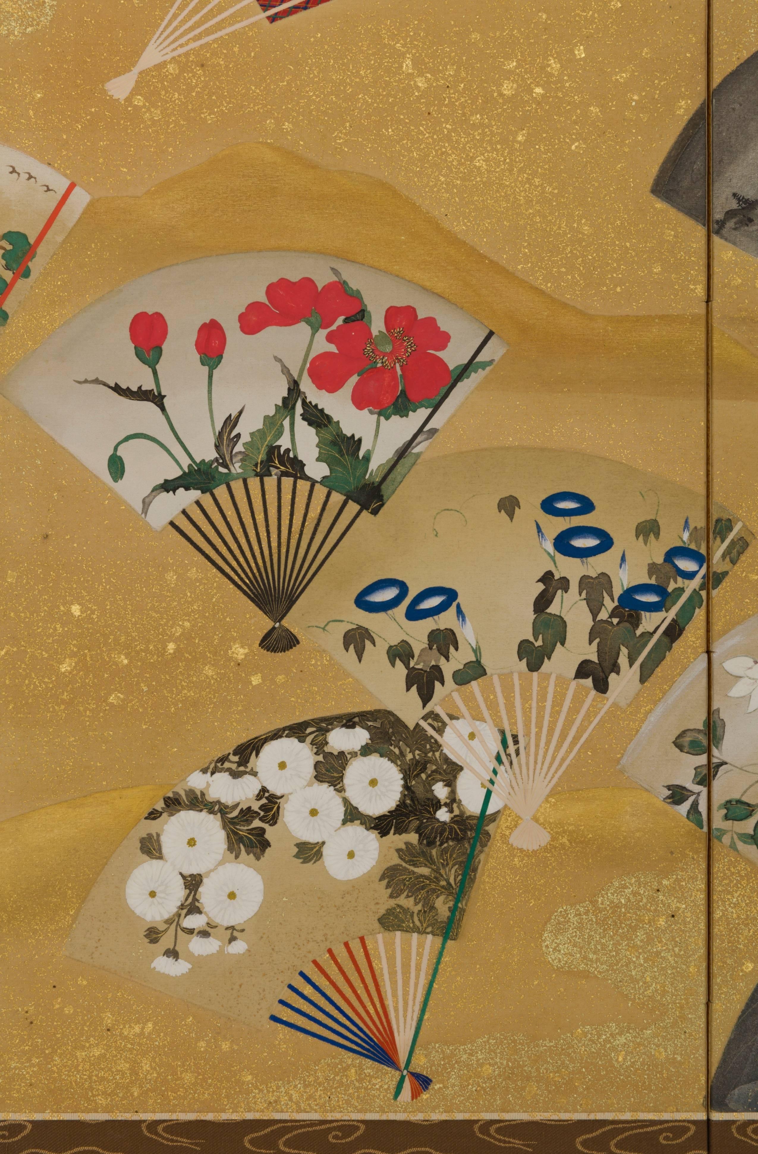 Small six-panel screen; mineral colors, gold wash, and gold flakes on silk
Scattered fans decorated with flowers of the different seasons.