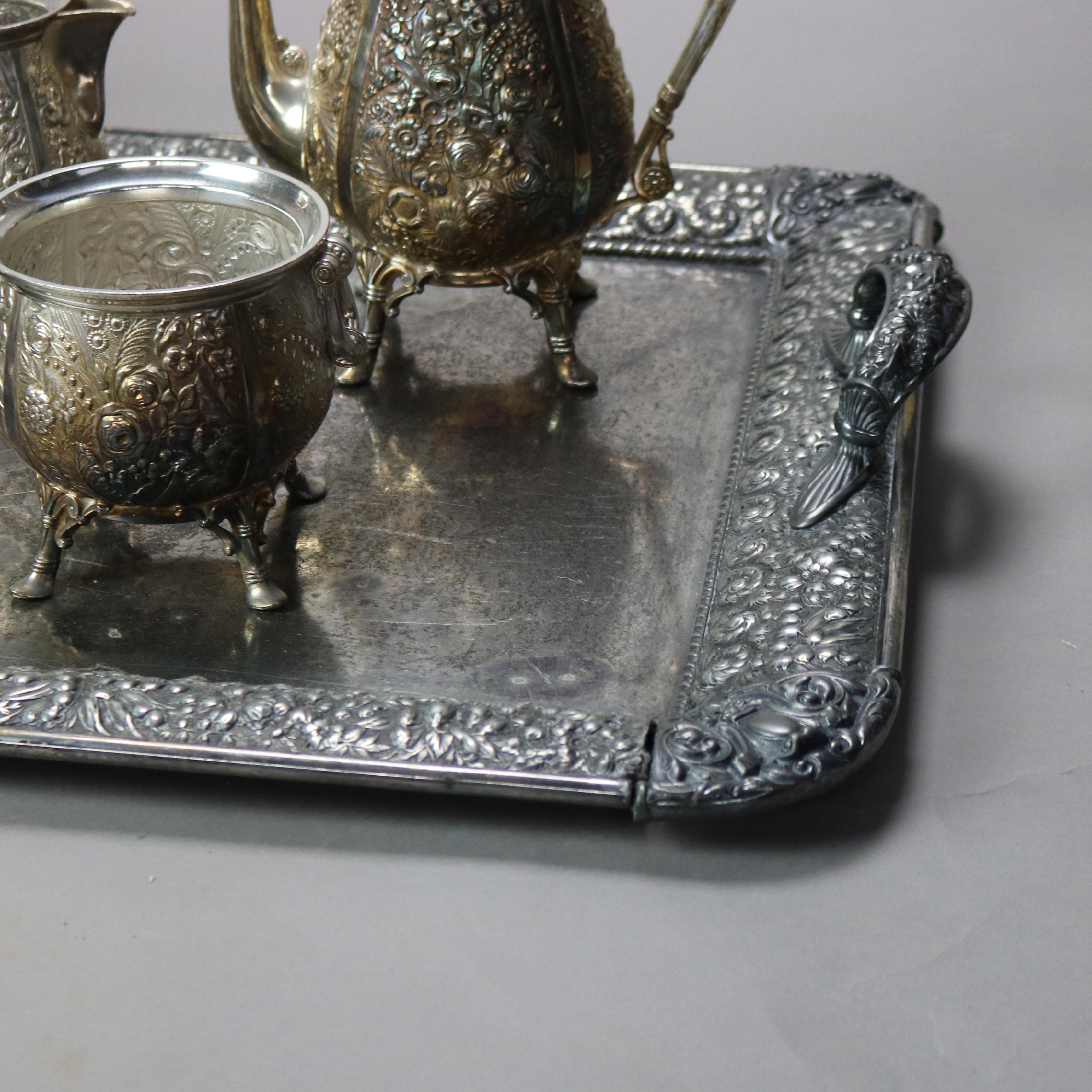 Set da tè antico in argento placcato floreale Repousse a sei pezzi C1890

Vaschetta dei rifiuti - 5 1/4