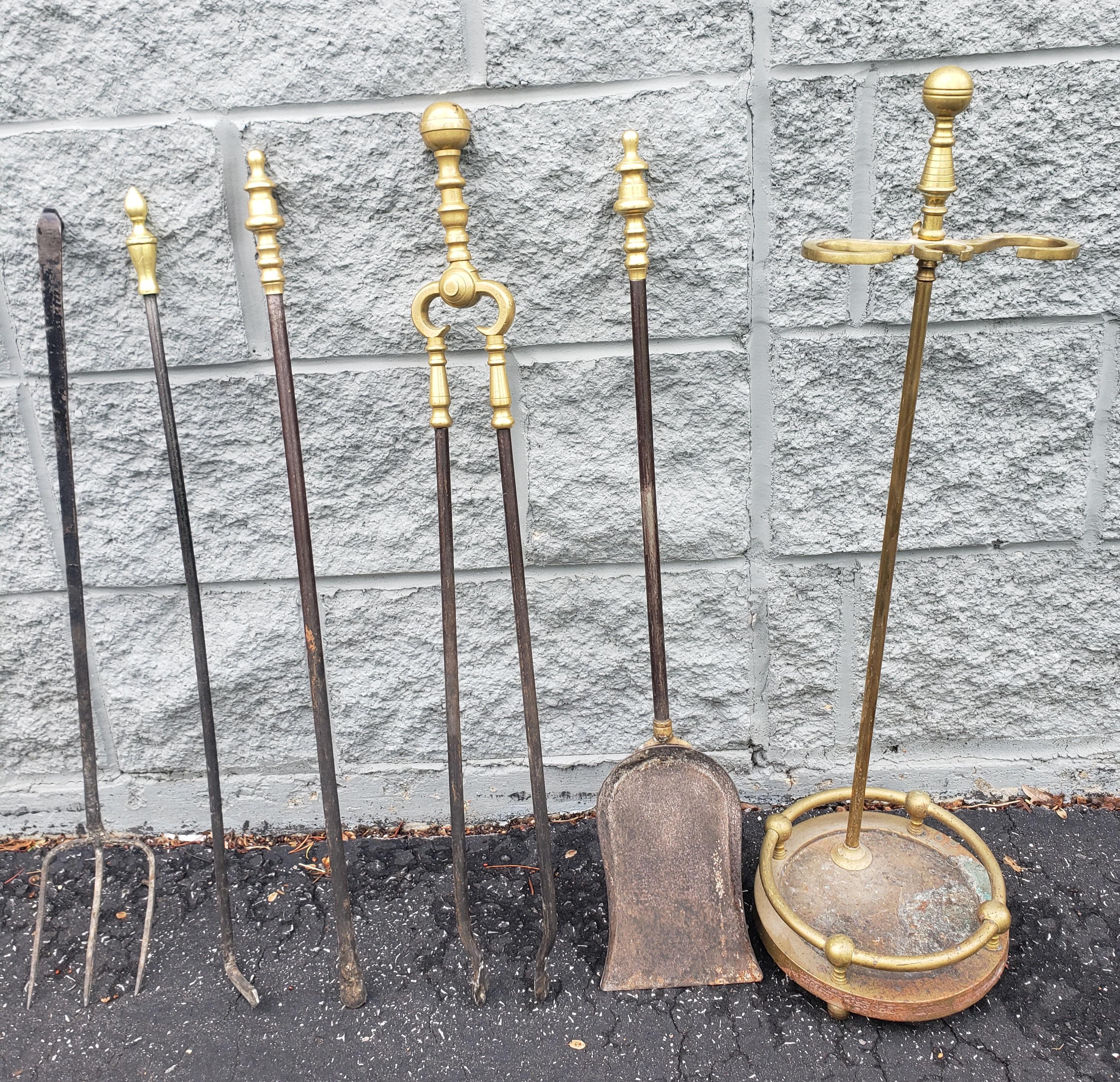 Six-Piece George III cast brass and iron fireplace tool set. Detailed pieces in pictures. 5 tools and stand.