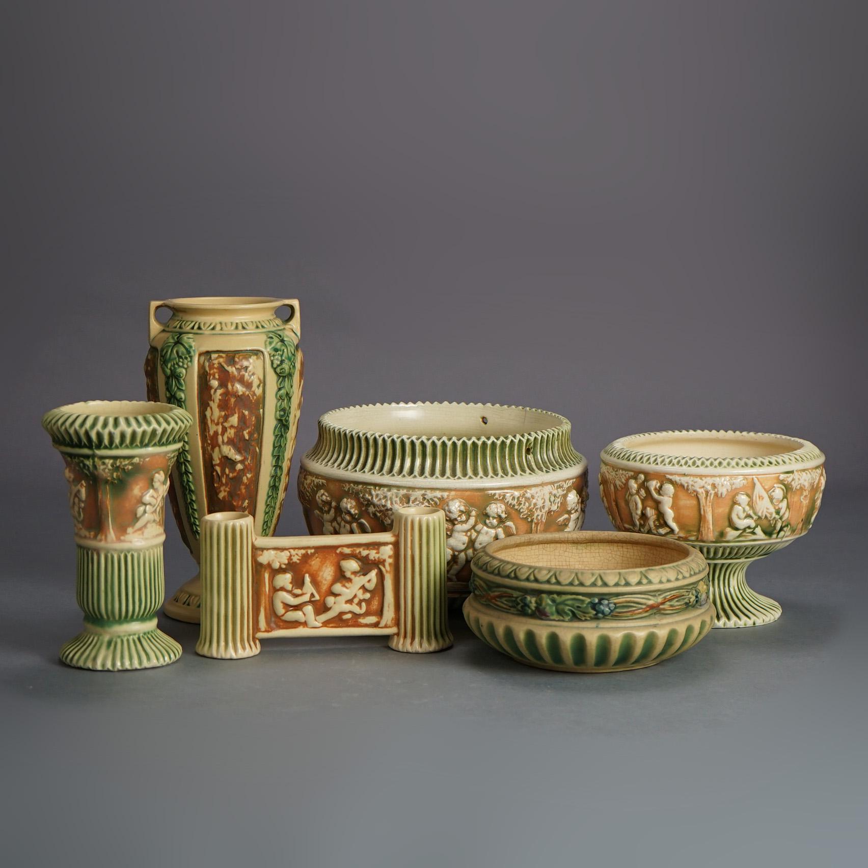 Six Pieces of Roseville Art Pottery, Donatello, Mid 20thC

Measures - tallest vase 10.5