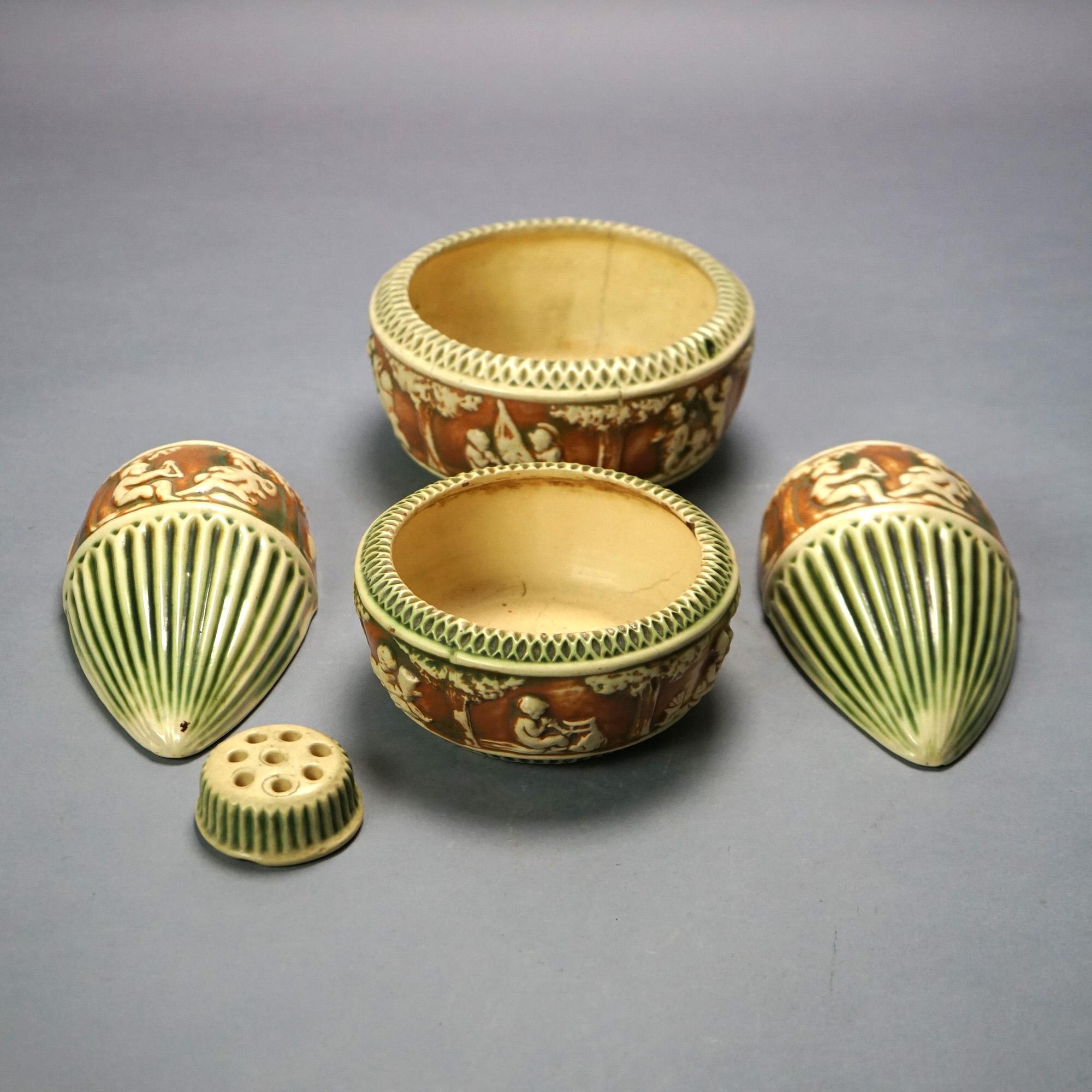Six Pieces of Roseville Art Pottery of the Donatello Line; Three Bowls, Two Wall Pockets & Flower Frog; Mid 20thC

Measures - largest bowl 3.5