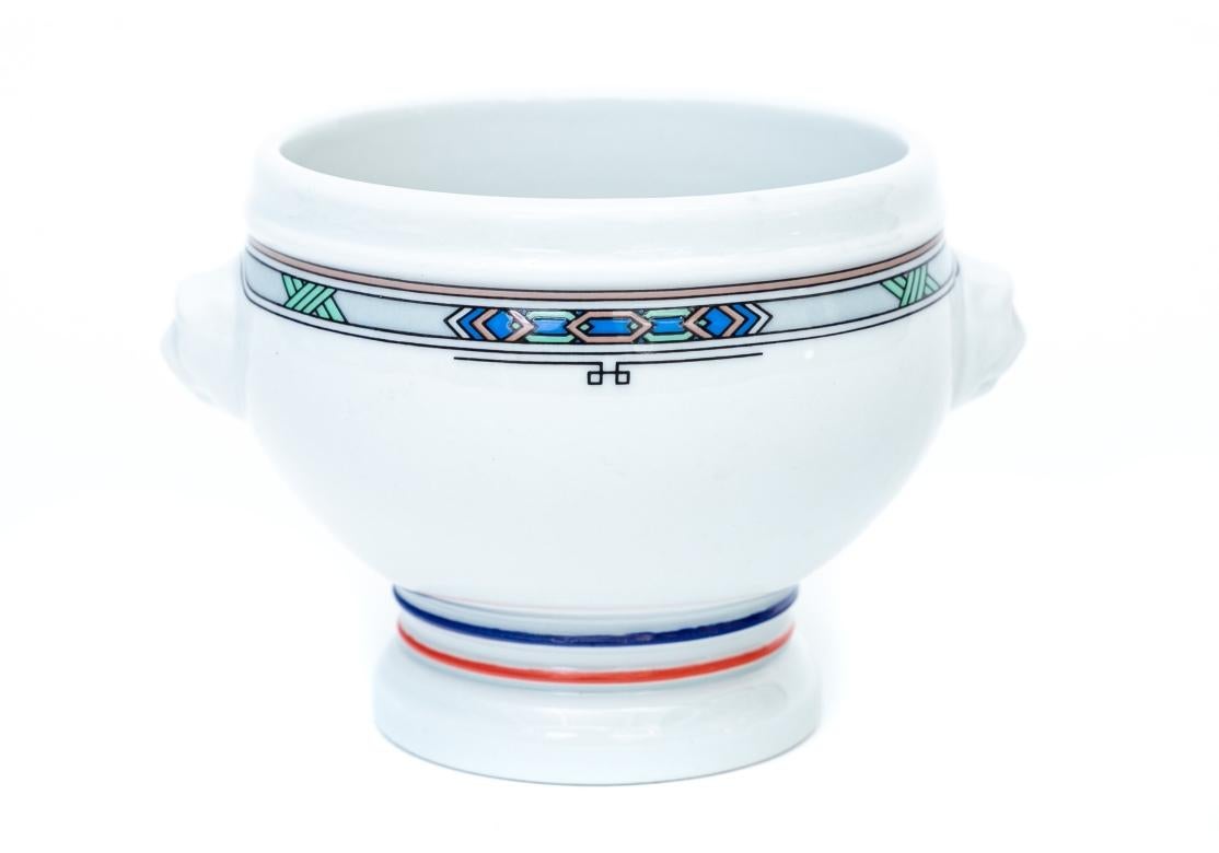 Set of 6 Paul Bocuse truffles soup bowls with lion head handles, red and blue stripes. Porcelain, made in France by Pillivuyt. Used in Le Cirque Restaurant.

Dimensions: 5