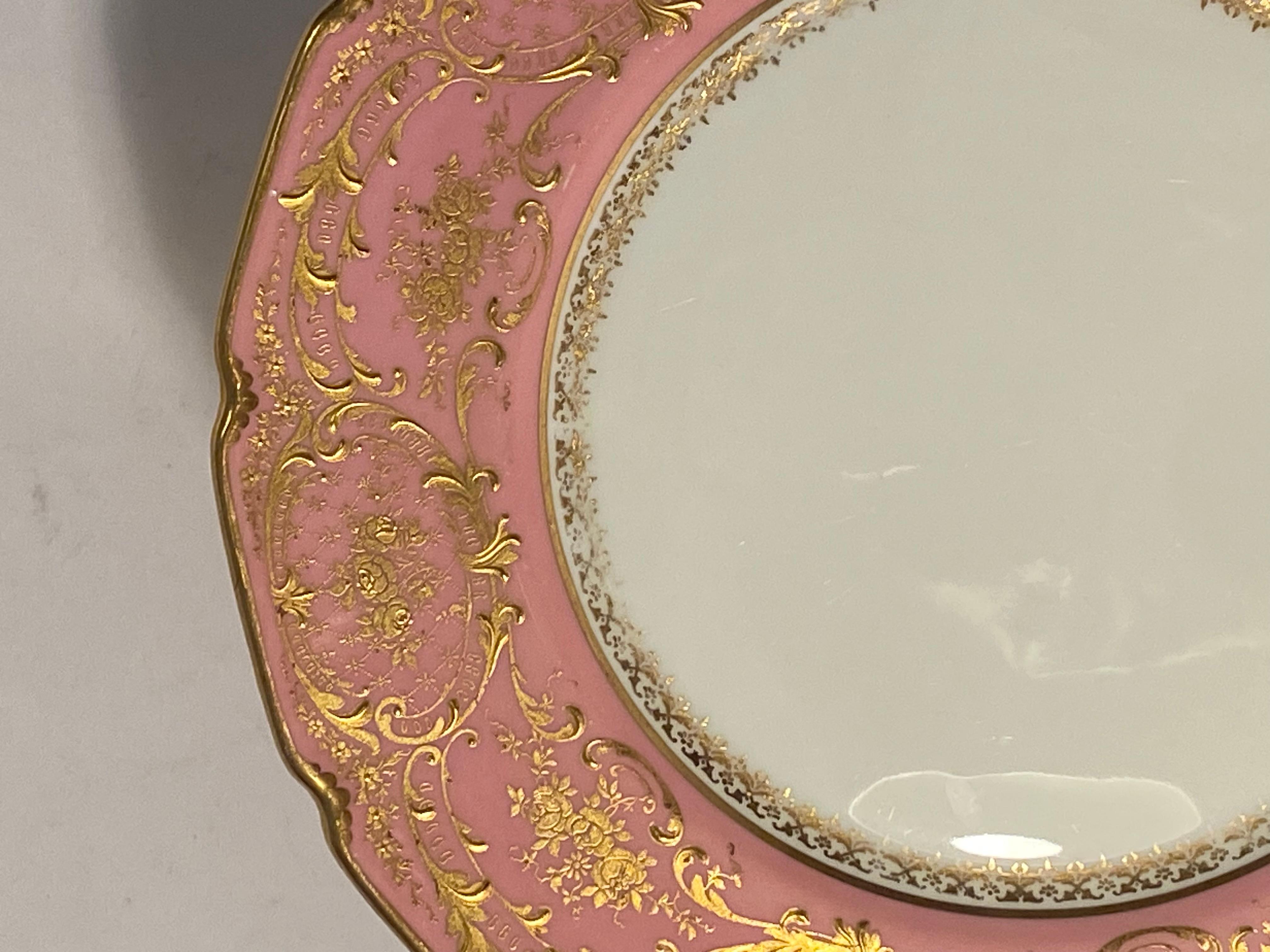 The pink color on this set of 6 dinner plates is so pretty and the raised floral gilt is throughout its collar. Custom ordered and retailed by the fine Gilded Age Retailer Hardy & Hayes Company of Pittsburgh. In very nice antique condition with