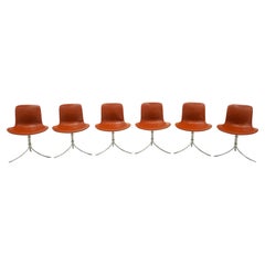 Sechs Poul Kjaerholm PK9 Stühle. Fritz Hansen. Edelstahl, cognacfarbenes Leder. Unterschrieben.
