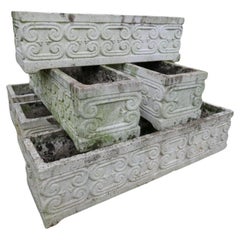 Seis jardineras de piedra reconstituida