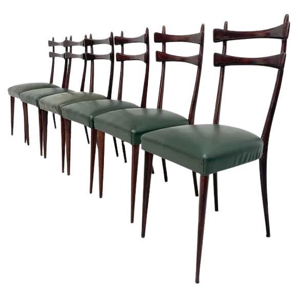 Six rosewood elegant Italian chairs, 1970's.

What a stunning set of dining chairs! These six dining chairs are made in Italy but from an unkown manufacturer. They were probably made in the 1970's and are a perfect example of Italian craftmanship