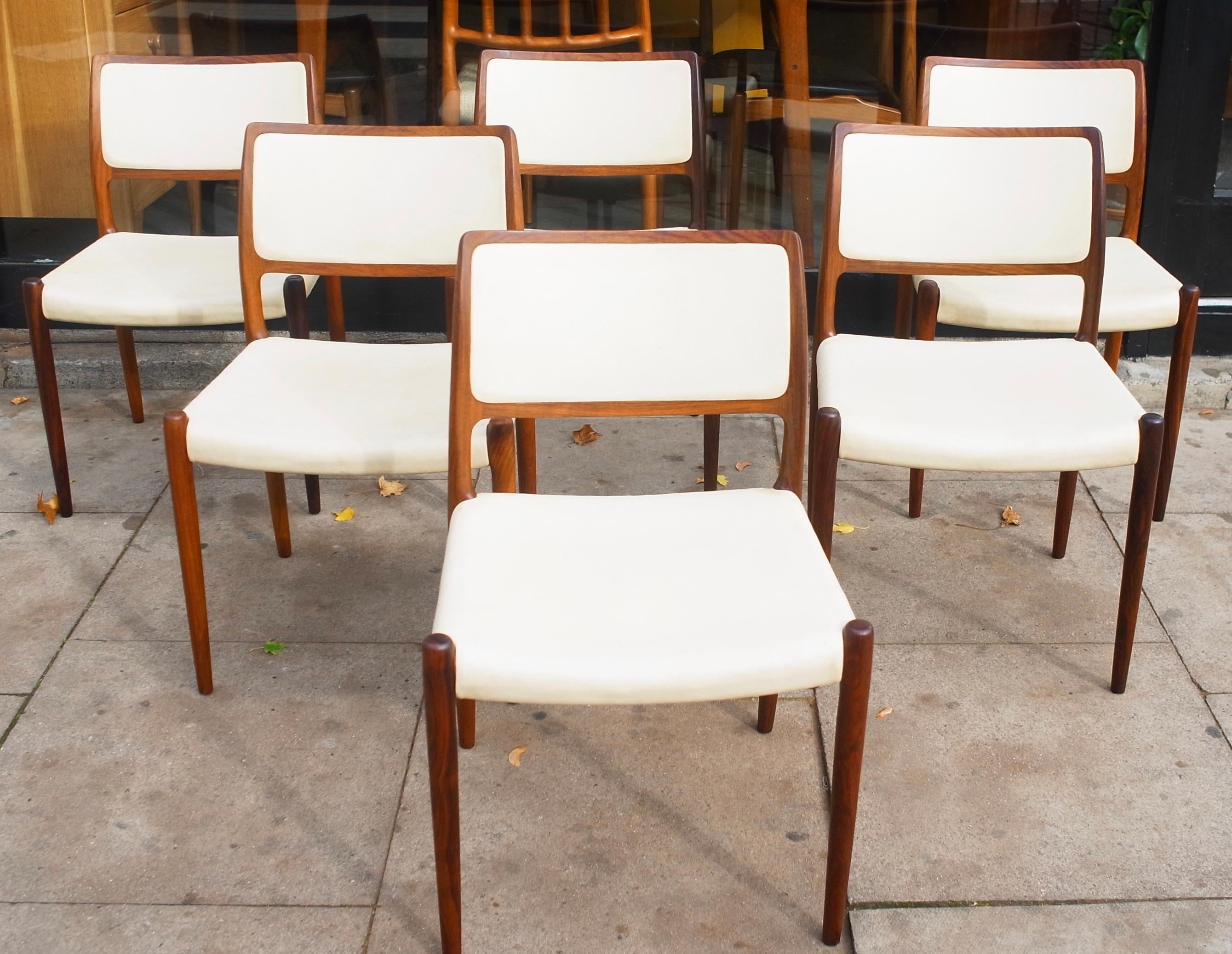 A stylish and beautiful  vintage set of six dining chairs model 80 designed by Niels Moller for J.L Møllers Møbelfabrik, Denmark 1968. These chairs are made of solid Hardwood which is in reasonable original condition, with only a little wear to the