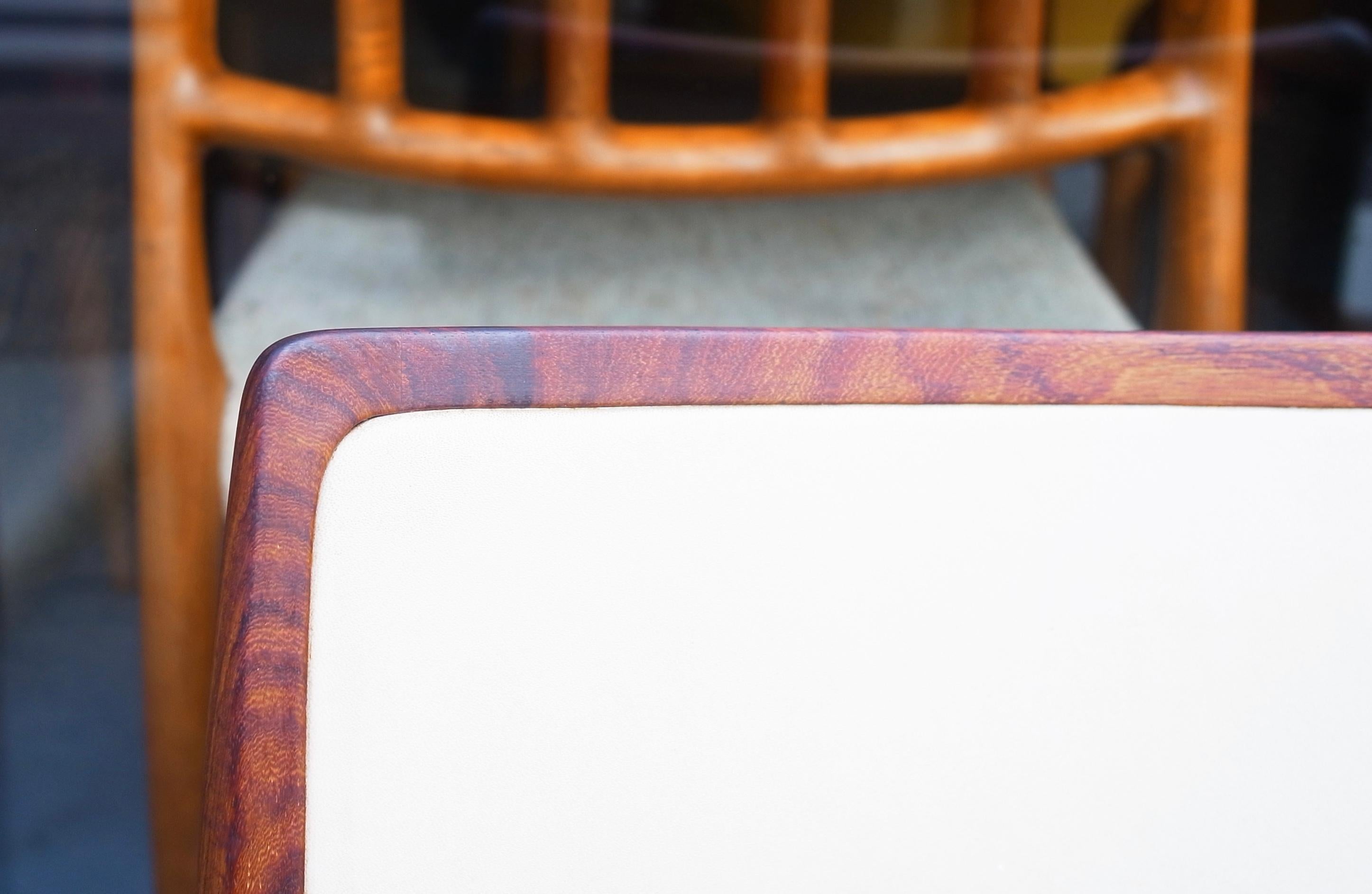 20th Century Six hardwood Niels Moller Model 80 Chairs, with cream vinyl upholstery For Sale