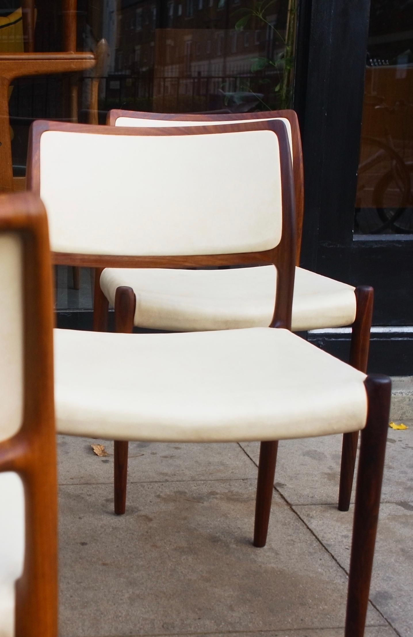 Hardwood Six hardwood Niels Moller Model 80 Chairs, with cream vinyl upholstery  For Sale