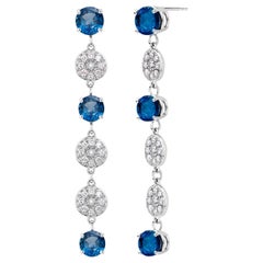 Six Round Blue Ceylon Sapphires and Diamonds White Gold Drop Dangle Earrings