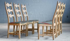 Six Set Brutalist Dining Chairs in Solid Carved Oak by Henning Kjærnulf 60's V