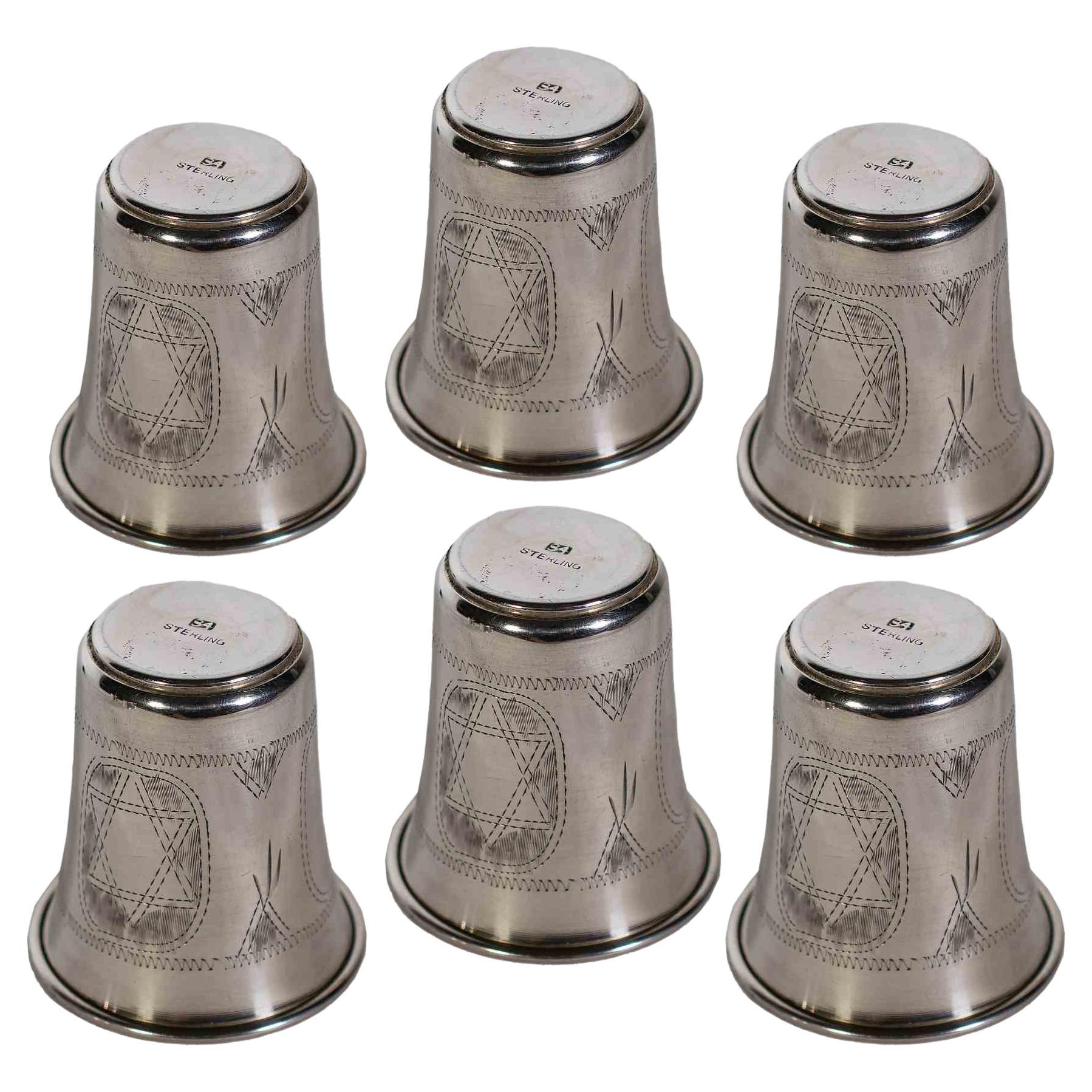 Six silver glass is a silver decorative item realized in the Early 20th Century.

A very elegant set of six little glass, finely decorated with a Star of David.

Don't miss this decorative silver object!.