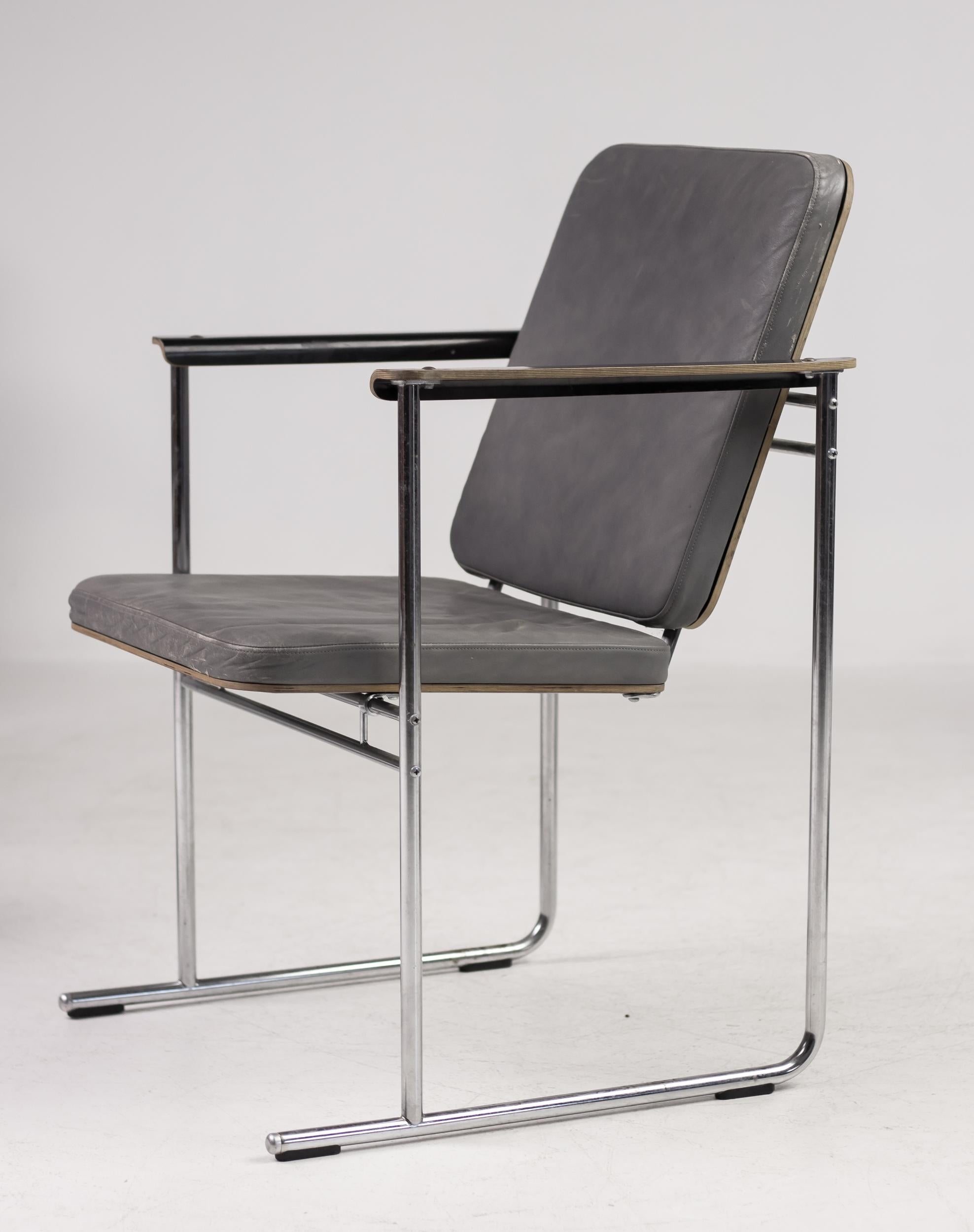 Set of six Skaala chairs designed by Yrjö Kukkapuro, made in Finland by Avarte.
Black enameled birch laminate seat and back, chrome-plated tubular steel frame, upholstery in grey leather.
Marked with label.