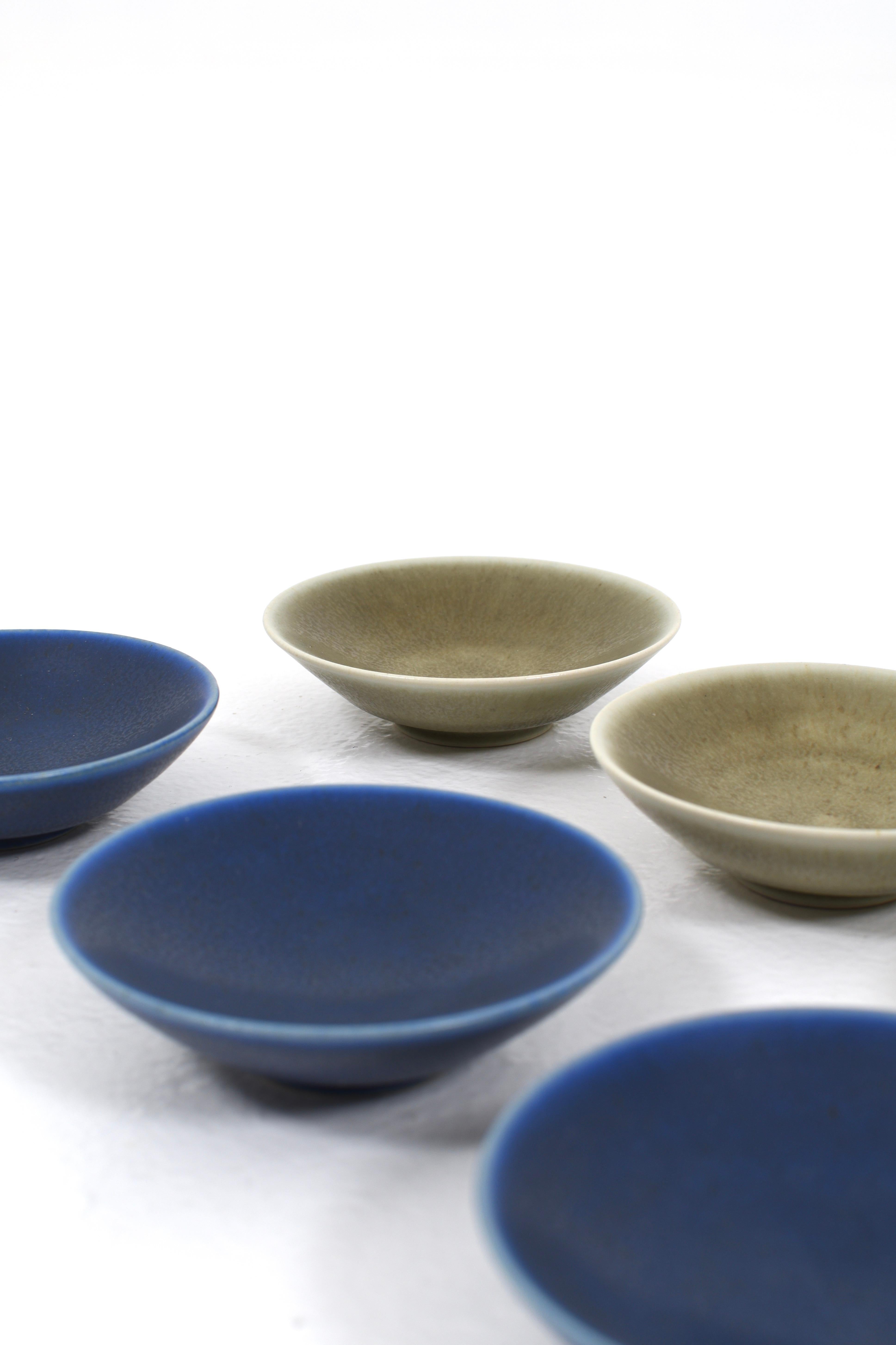 Six small bowls designed by Per Linnemann-Schmidt, Palshus, Denmark.

Three bowls have blue harpsichord glaze and three have green harpsichord glaze. The bowls are signed on the bottom and in very fine condition. All bowls are sold together.