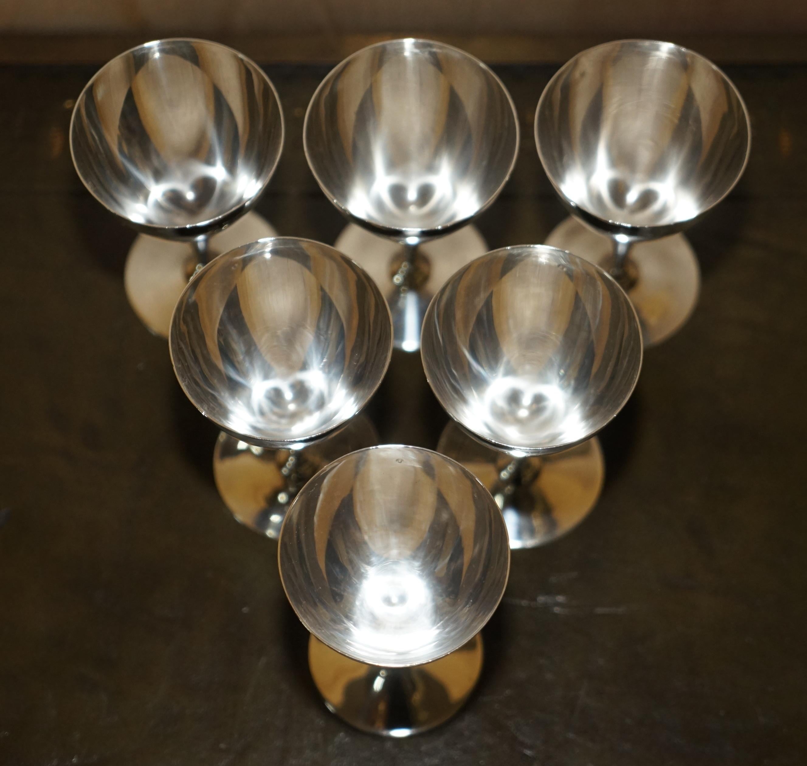 Royal House Antiques is delighted to offer for this suite of six original Tiffany & Co New York made Sterling Silver cup goblets which were retailed through Asprey London

These are a super decorative luxury suite of Sterling silver goblet cups,