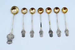 Six spoons and sugar ladle with 200/500 reis coins and Portuguese arms