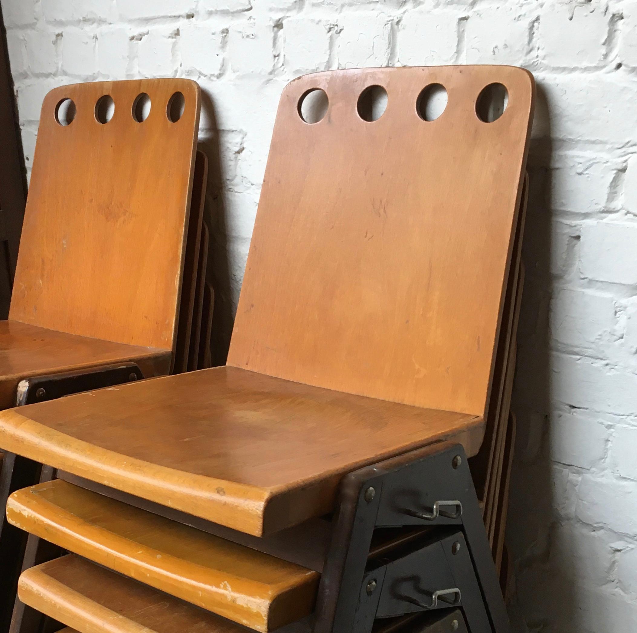 Stackable set of six industrial chairs.
Curved maple seat on a wood scissors base.
Perforated back.
In the spirit of Jean Prouvé, France, 1950.
