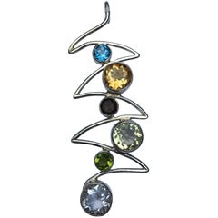 Six Stones Wave Pendant Set in Sterling Silver