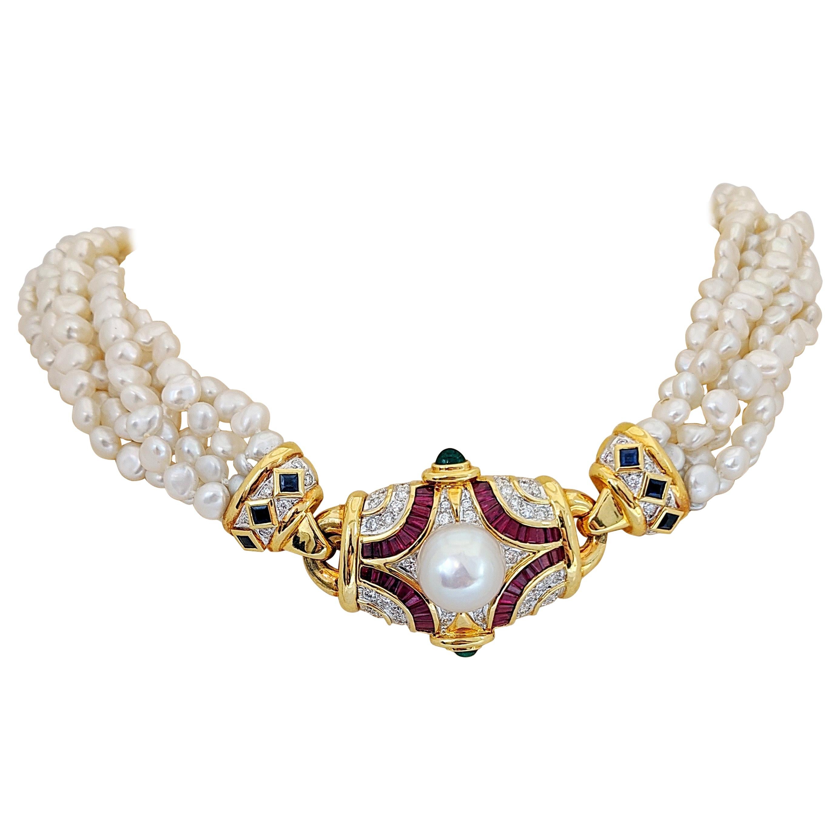 Six Strand Pearl Necklace with Diamond, Ruby, Emerald, and Blue Sapphire Center