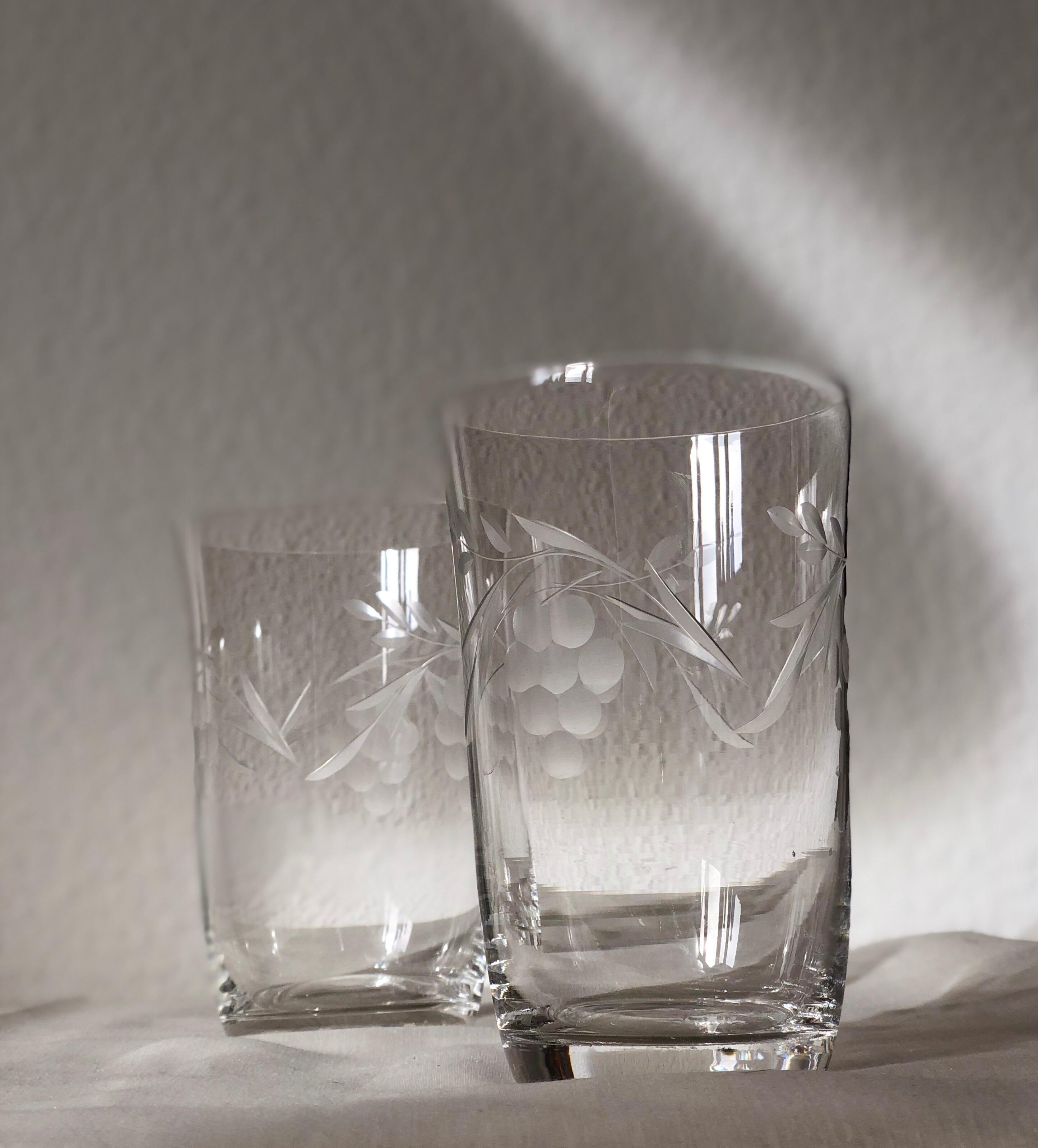 Stunning antique Victorian glasses on a stand grape engravings.