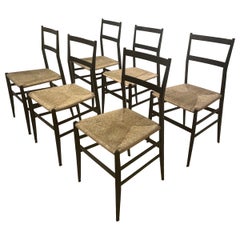 Six chaises Superleggera de Gio Ponti