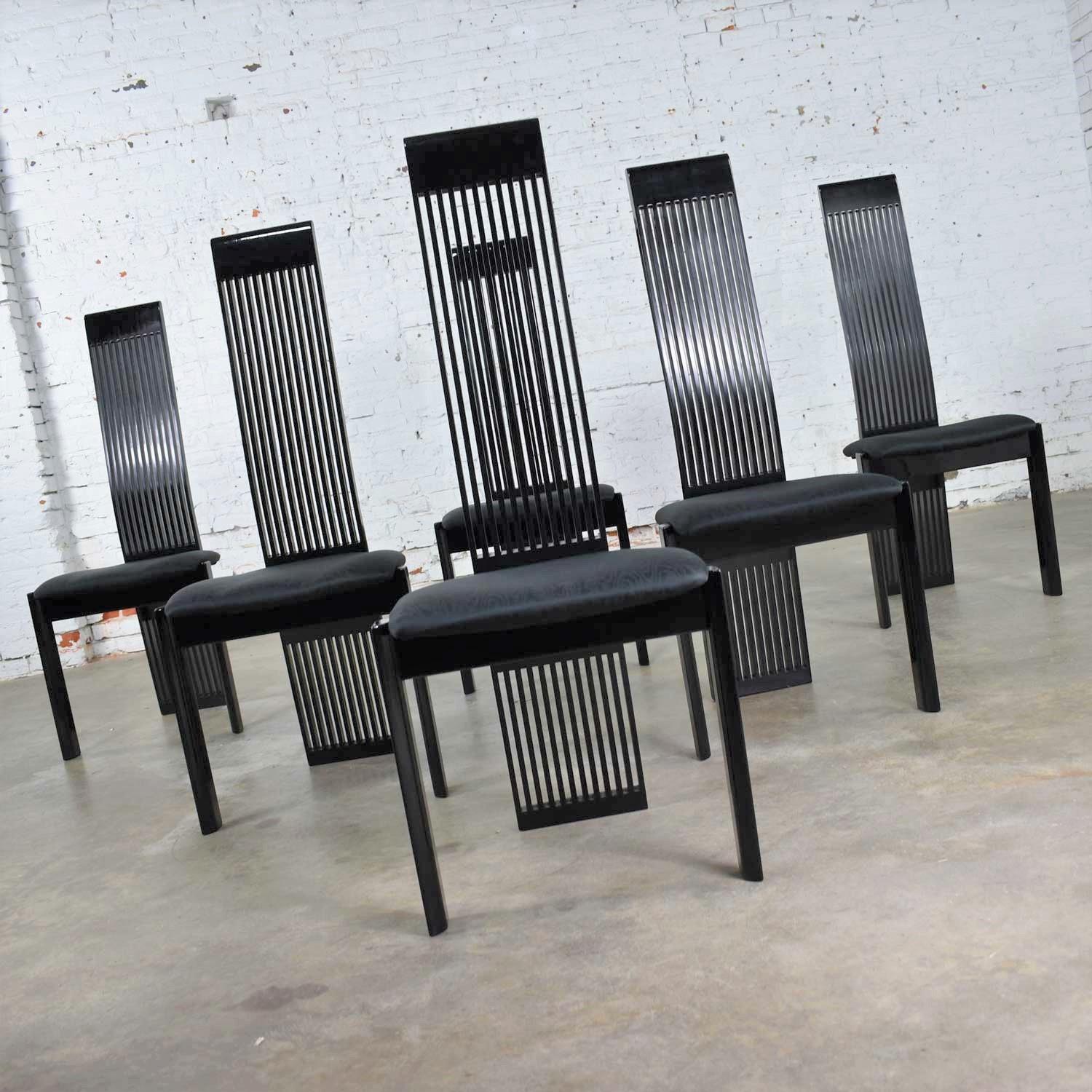 Extraordinary set of six Postmodern black lacquer dining chairs made in Italy by Pietro Costantini. And most likely imported and offered by Ello although they do not have the Ello tag attached. They are in wonderful vintage condition. They had some