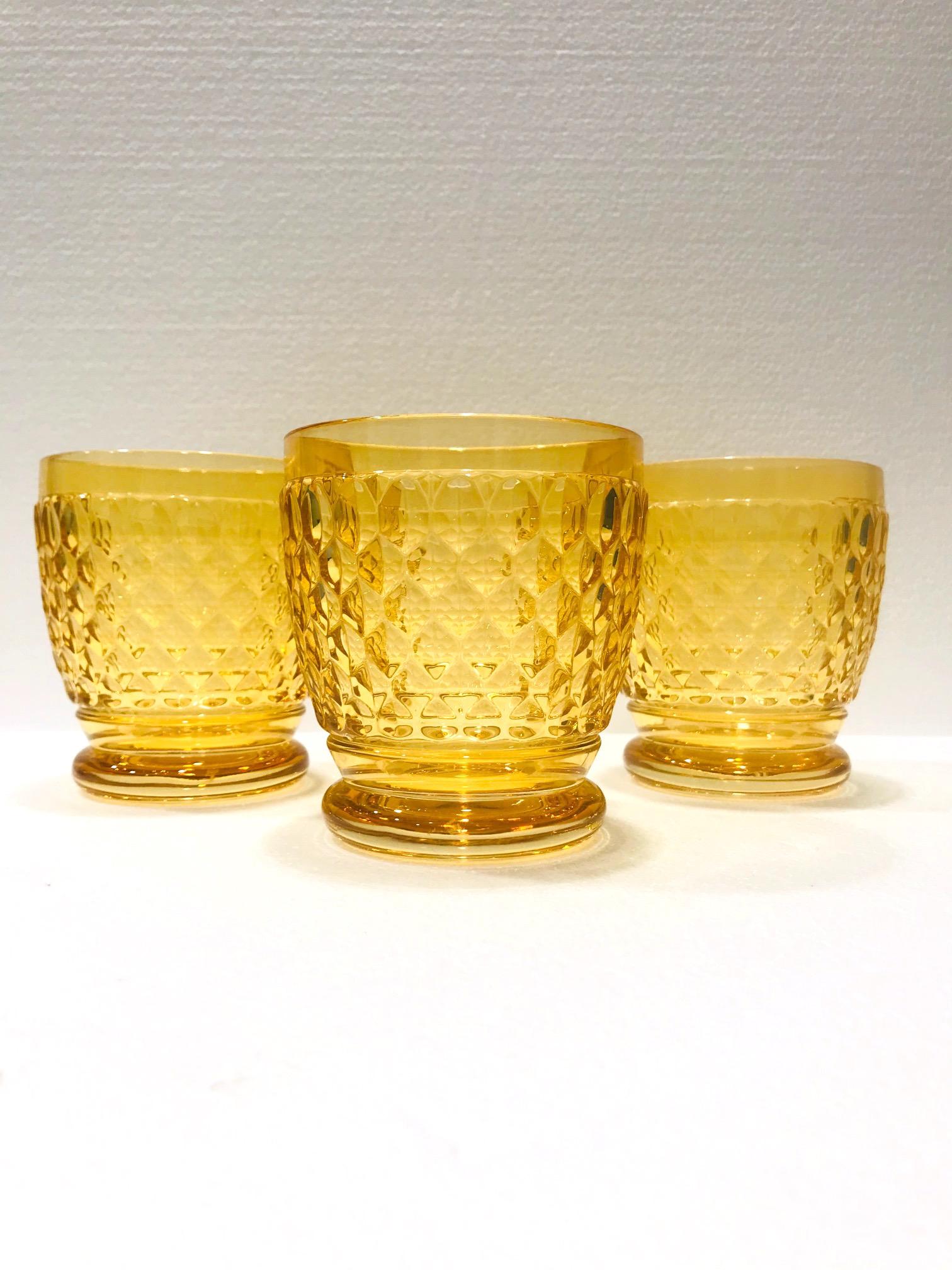 Vintage double old fashioned crystal barware glasses for cocktails or water from Villeroy & Boch. The glasses are comprised of hobnail crystal with a Classic diamond pattern and with rounded bases. Available in gorgeous amber yellow colored glass,