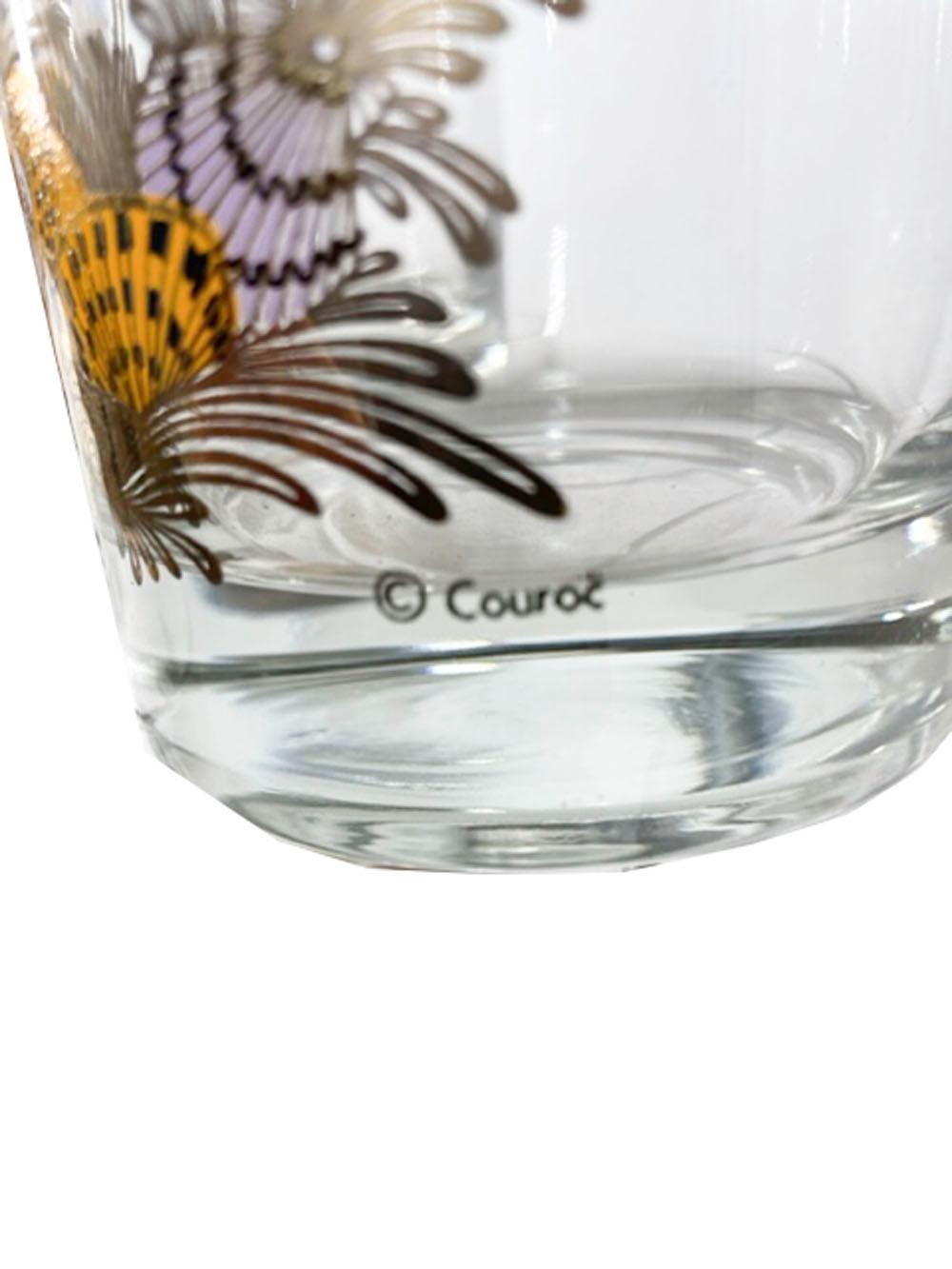 Six double rocks cocktail glasses by Couroc of Monterey with seashells and seaweed in purple and amber enamels with 22k gold.