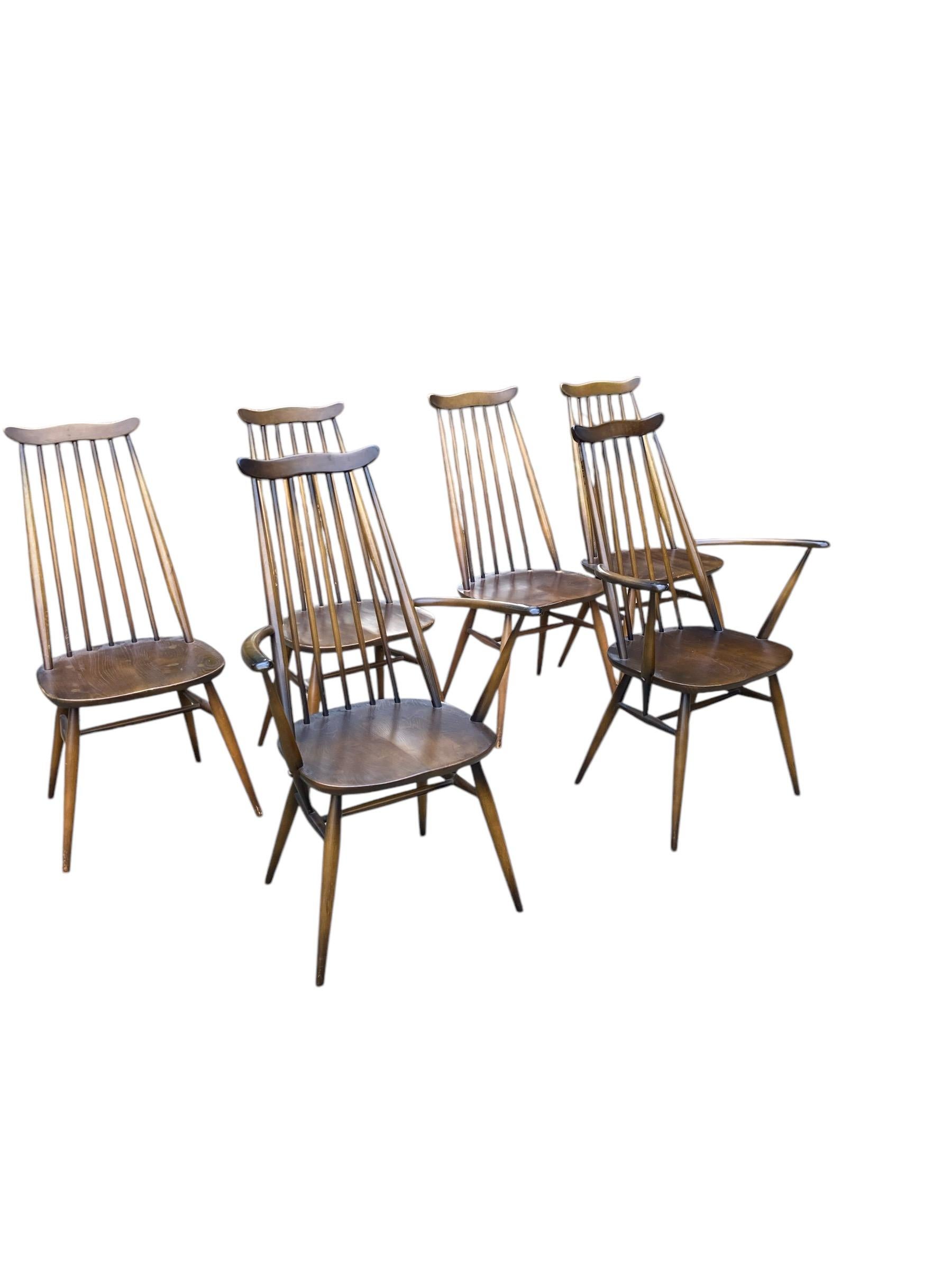 Sei sedie vintage Ercol con schienale a bacchetta e due poltrone in vendita 1