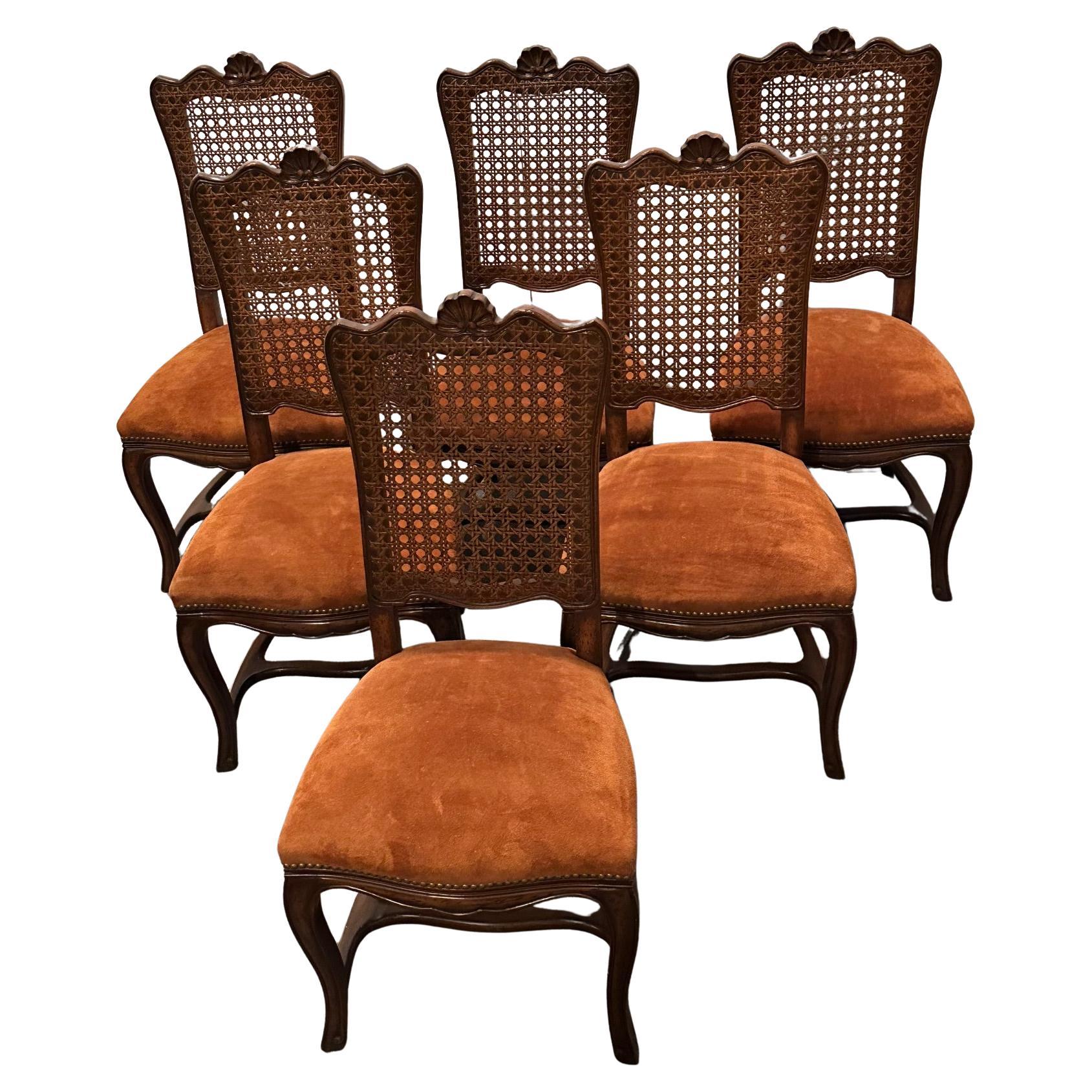 Six Vintage French Provincial Style Cane Back Dining Chairs with Suede Seats For Sale