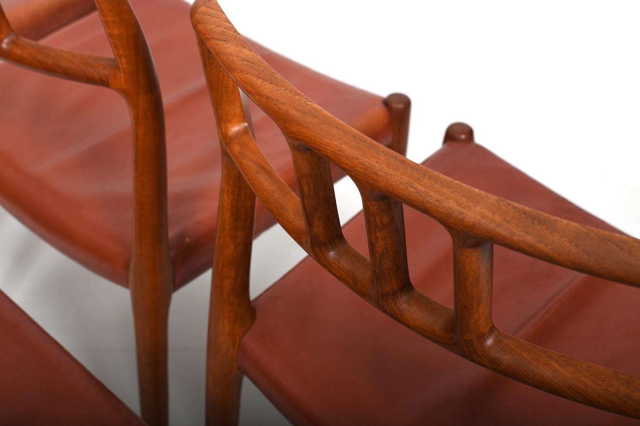 20th Century Six vintage Niels O. Møller Teak and Indian Red Leather Chairs For Sale