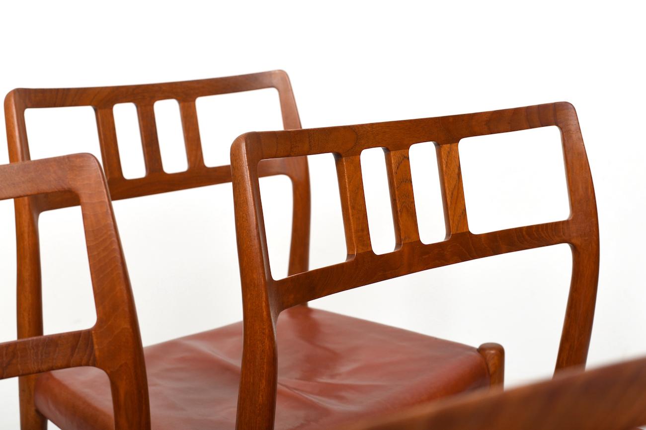 Six vintage Niels O. Møller Teak and Indian Red Leather Chairs For Sale 2