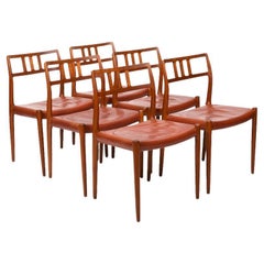 Six Vintage Niels O. Møller Teak and Indian Red Leather Chairs