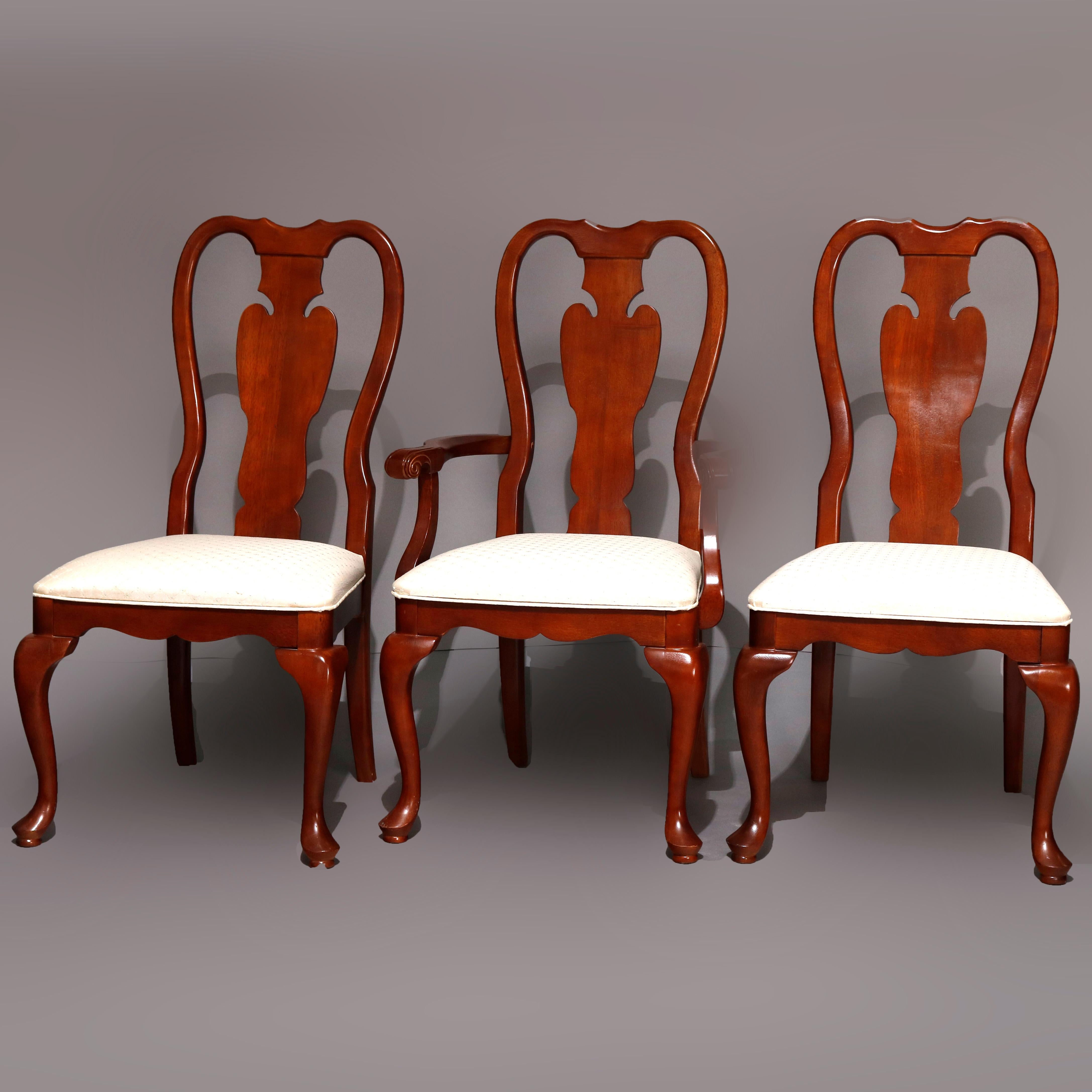 A vintage set of 6 dining chairs by Universal Furniture in the manner of Pennsylvania House offer cherry construction in Queen Anne styling with backs having shaped rail and stylized urn slat backs over upholstered seats raised on cabriole legs with